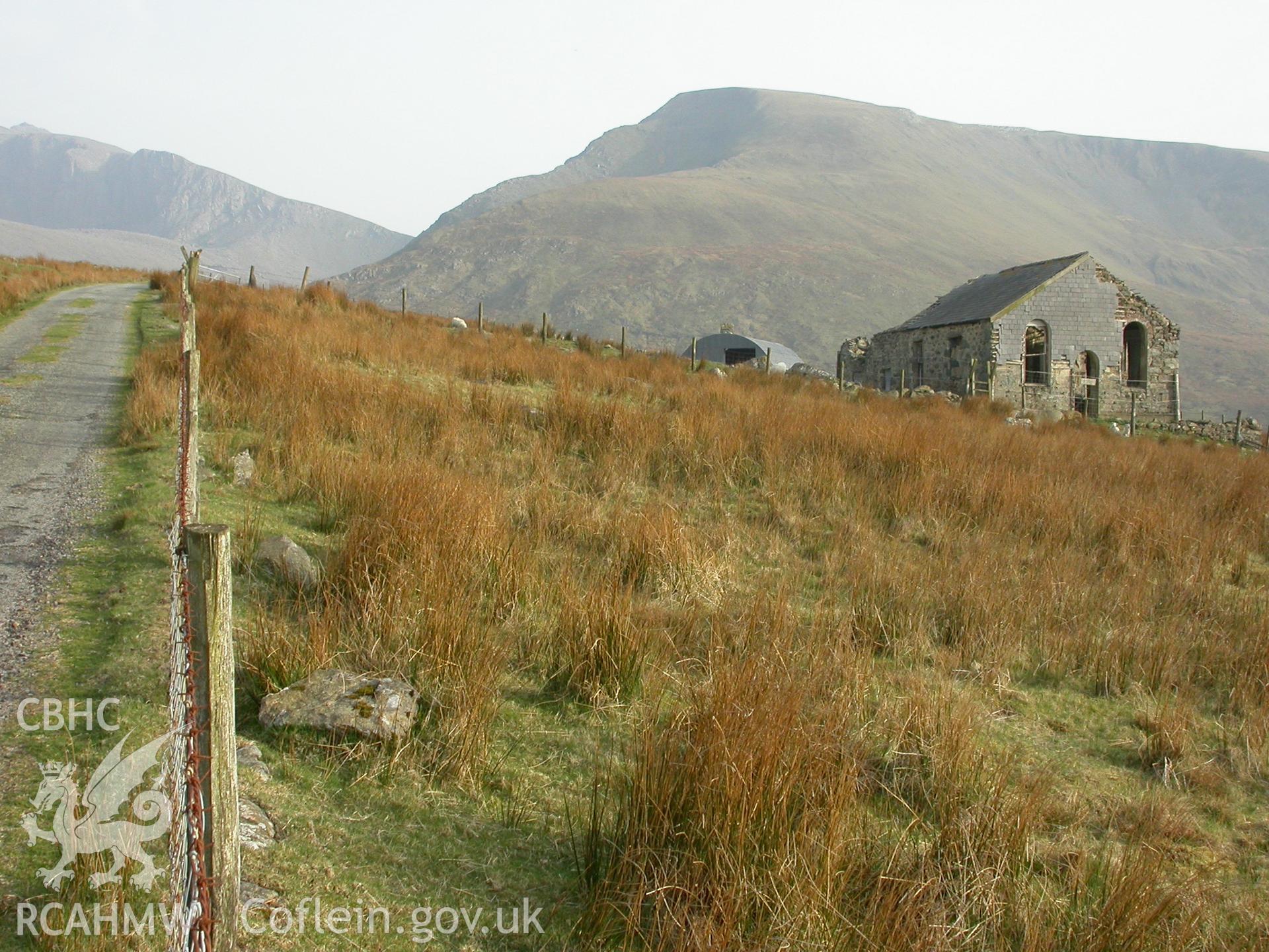 Chapel in landscape L.H. side with snowdon summit