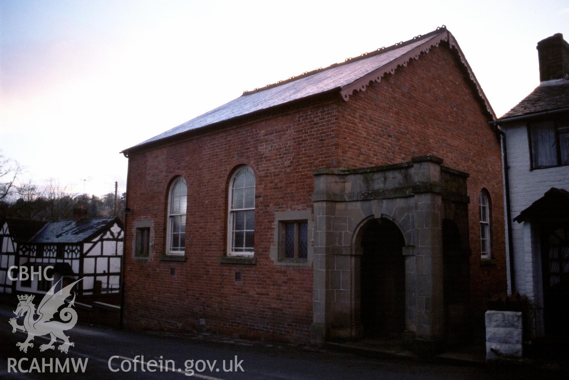 Exterior, long-wall, roadside, elevation & NW gable entry & porch