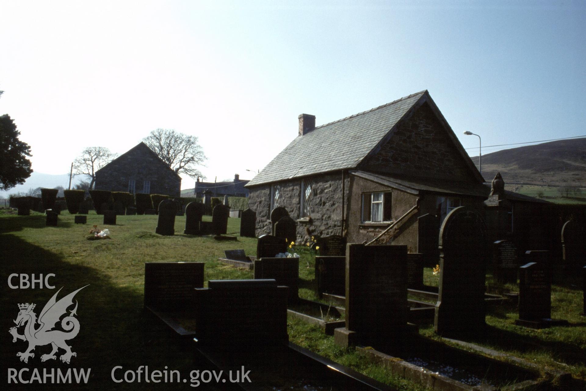 Exterior, view W. in graveyard with SS & former chapel