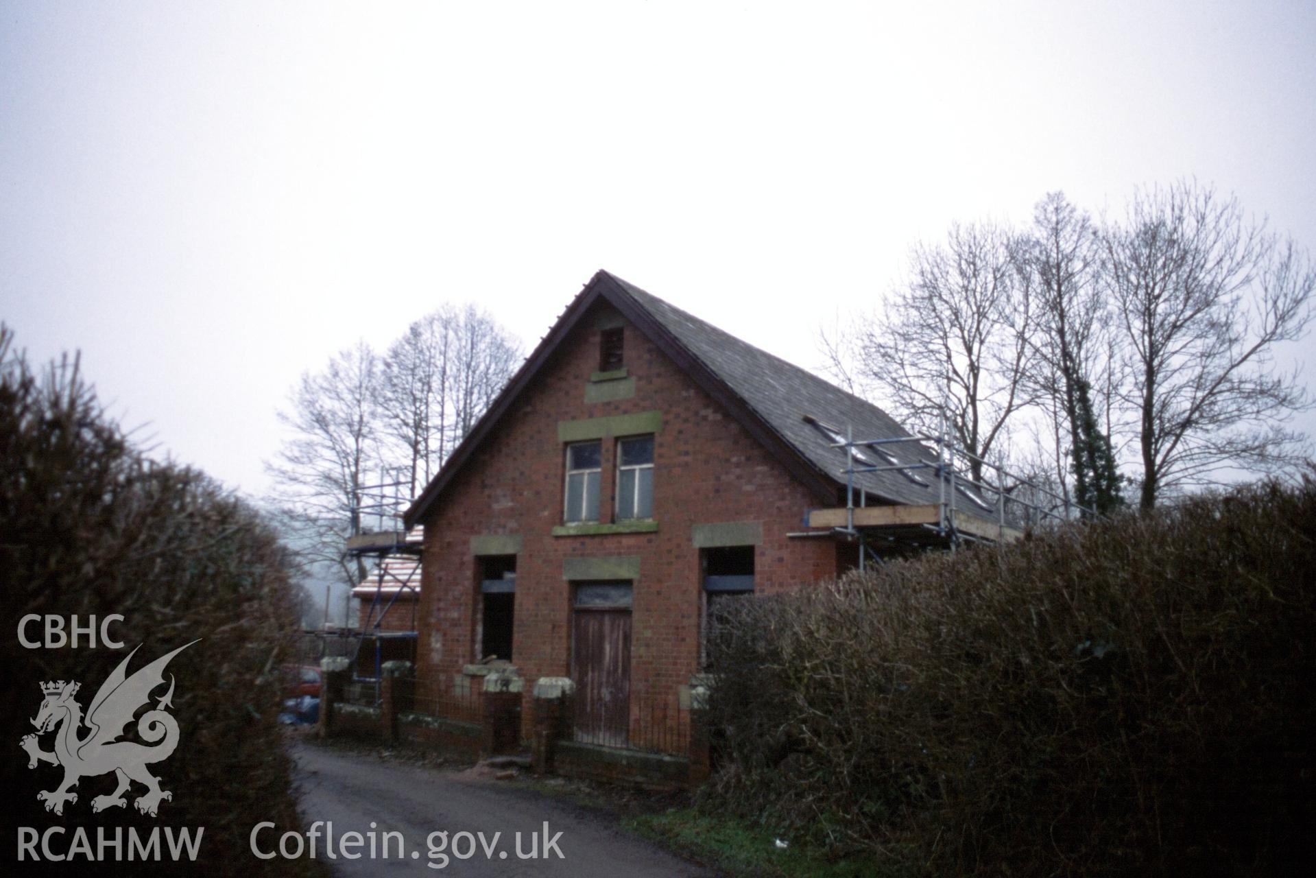 Exterior, front gable and rh roof pitch