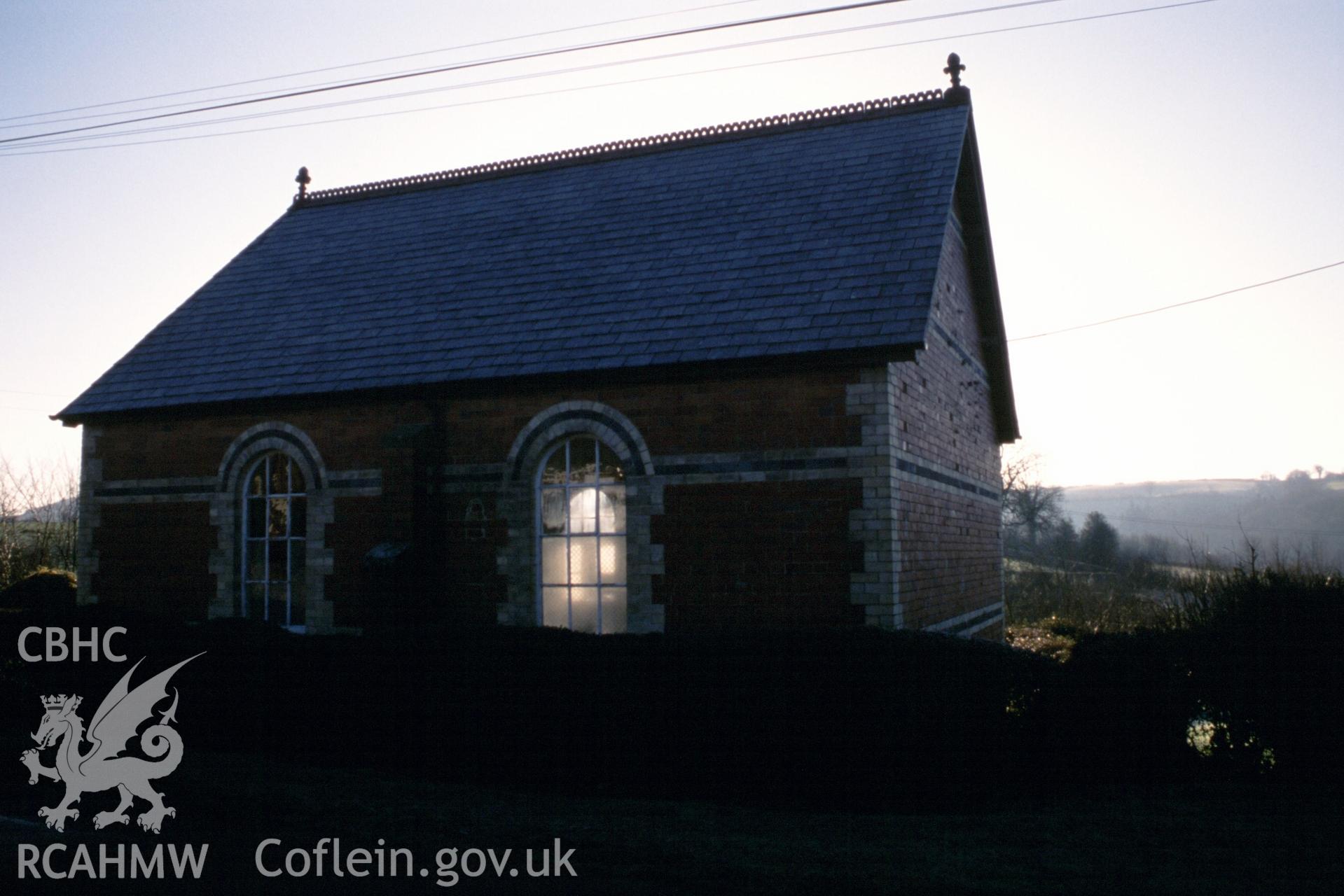 Exterior, W gable & N long wall (needs lightening: sun)