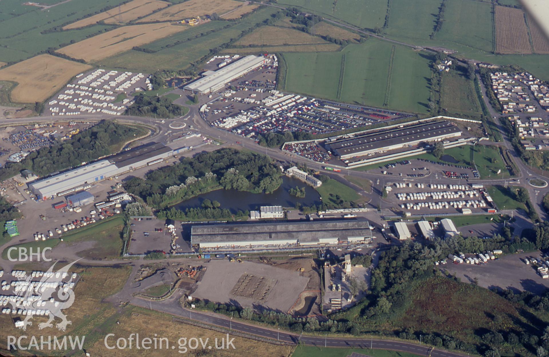 RCAHMW colour slide oblique aerial photograph of Wentloog Industrial Park Dispersal Sheds, Trowbridge, taken on 05/08/1998 by Toby Driver