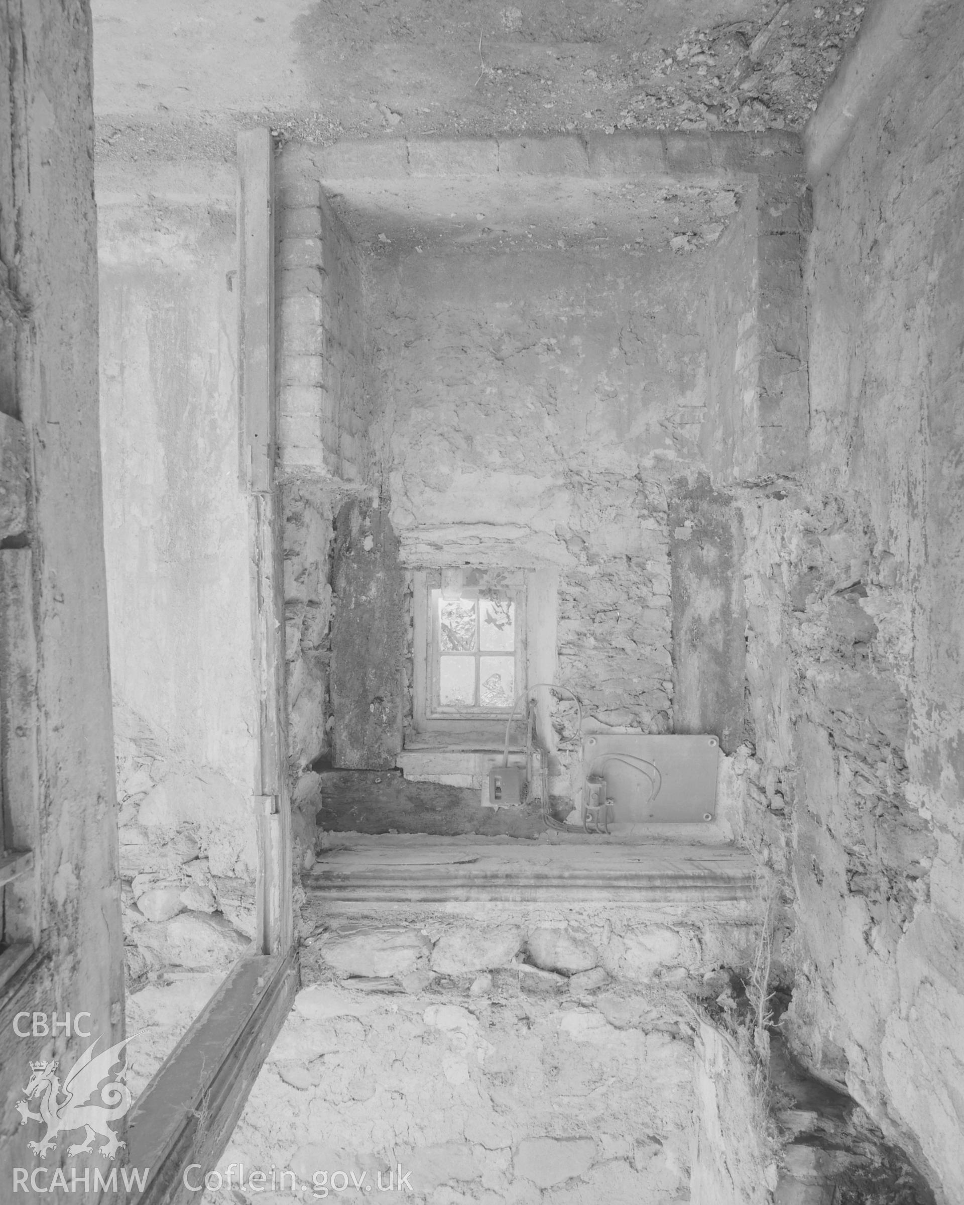 Concealed Tudor-arched passage doorway