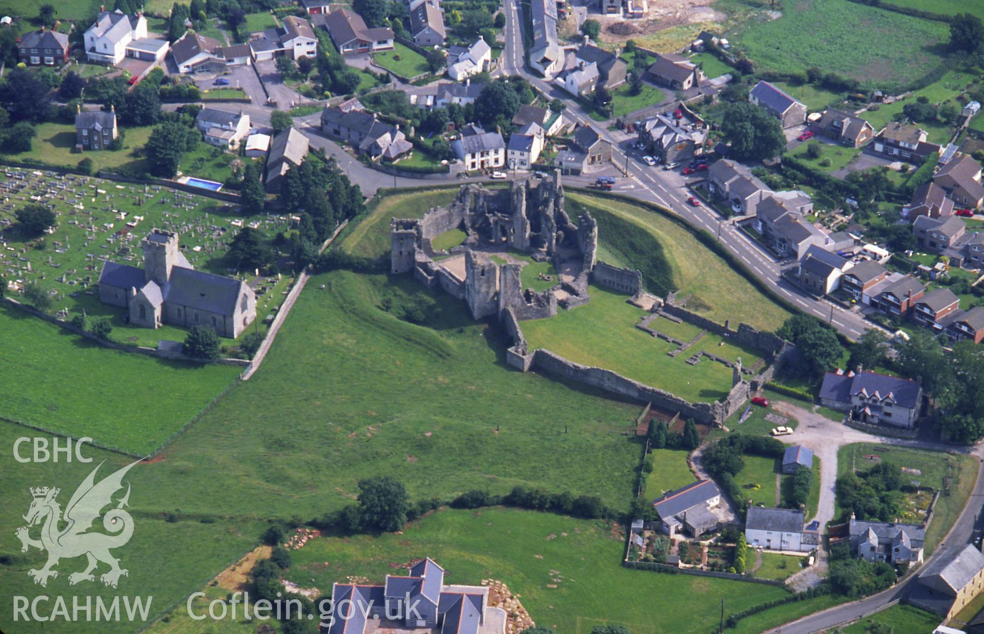RCAHMW colour slide oblique aerial photograph of Coity Castle, taken on 30/07/1992 by CR Musson