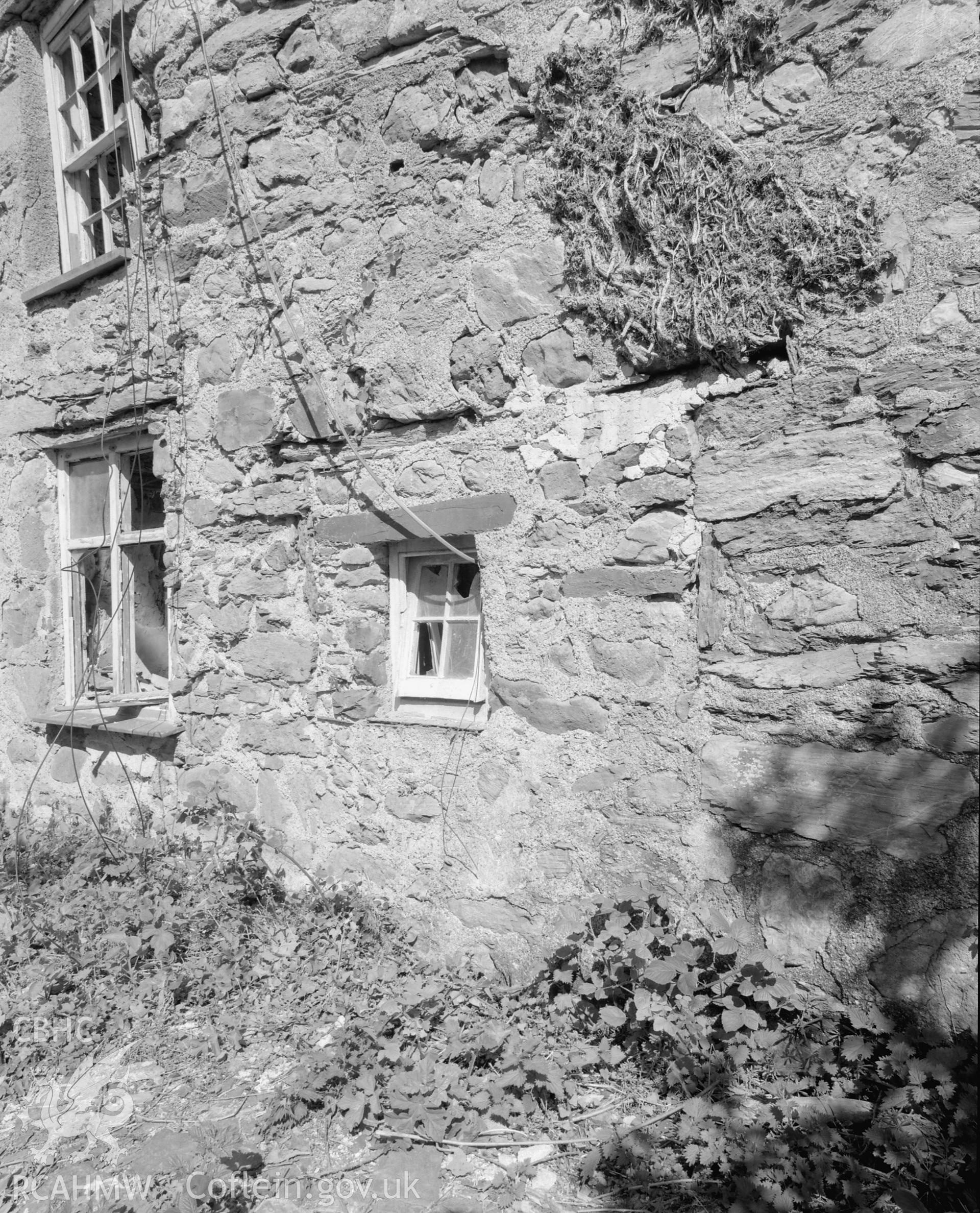 View of W front, blocked passage doorway