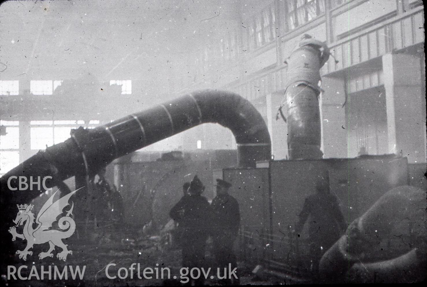 Digital photograph showing wreckage of no5 turbine and fire crew, after the 1957 disaster at Uskmouth Power station