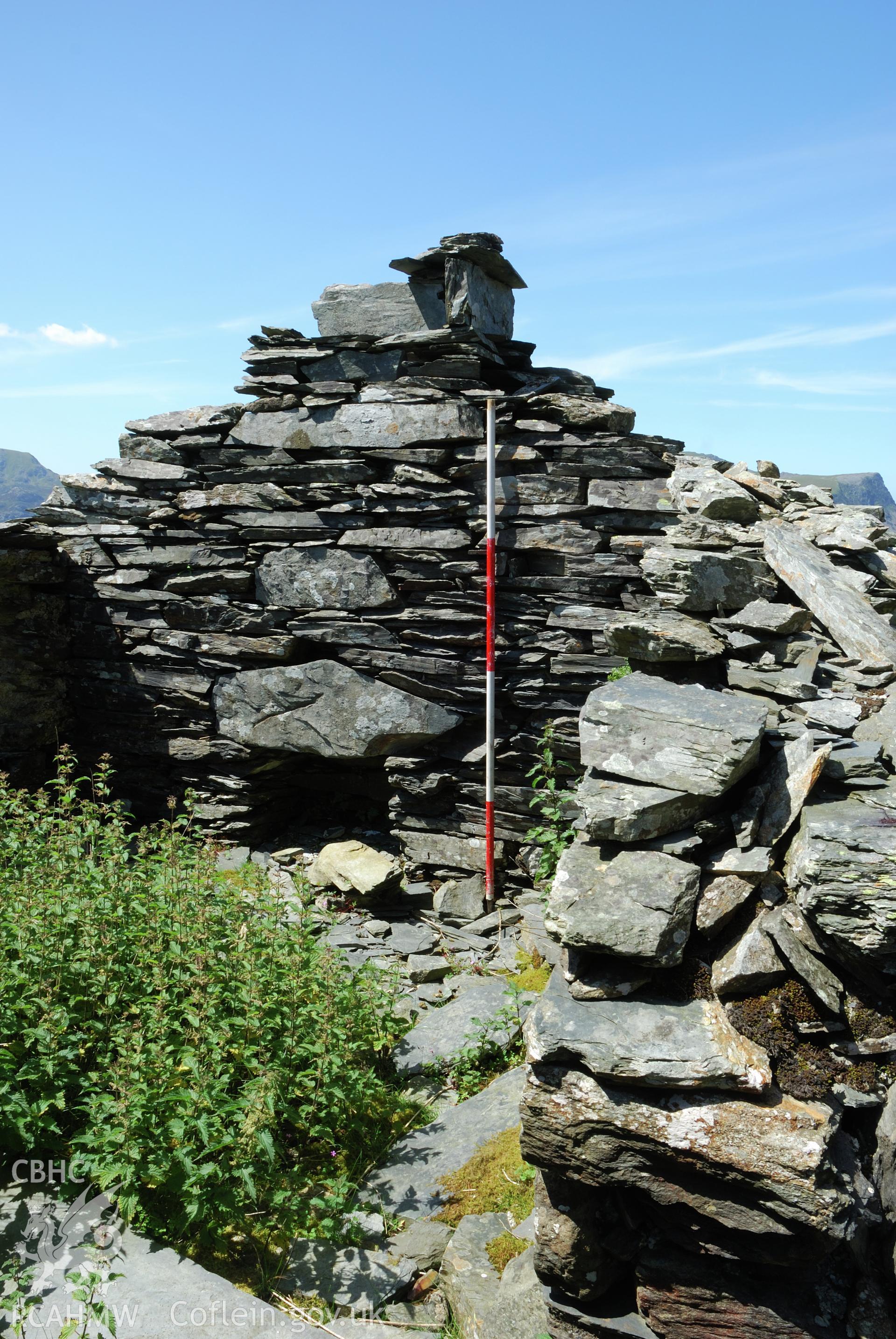fireplace in W gable end.