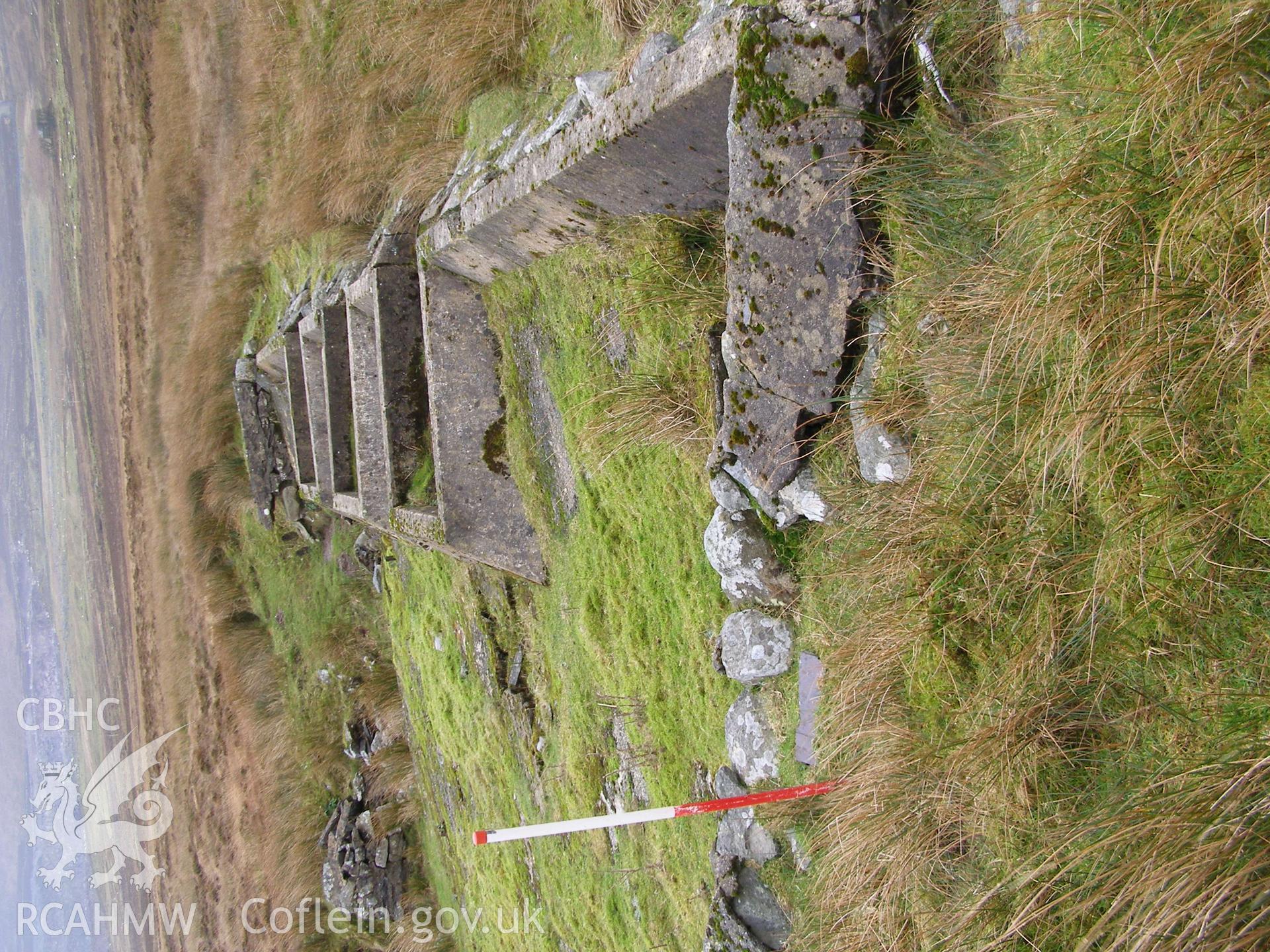 Digital colour photograph of a dam at Llyn y Mynydd taken on 22/01/2008 by P.J. Schofield during the Snowdonia Bethesda Upland Survey undertaken by Oxford Archaeology North.