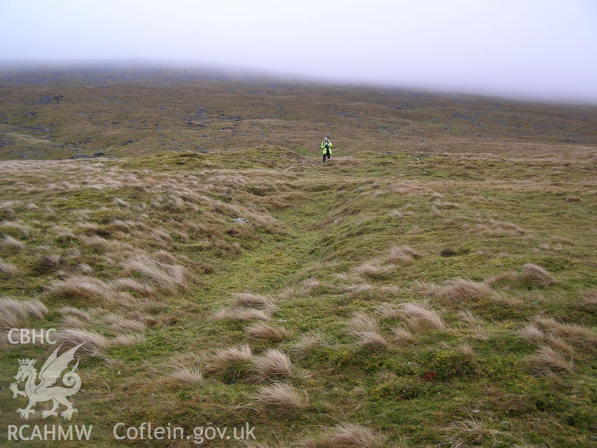 Digital colour photograph of Gwastad Ffynnon-Deg trial mine III taken on 15/01/2008 by P.J. Schofield during the Snowdonia Bethesda Upland Survey undertaken by Oxford Archaeology North.