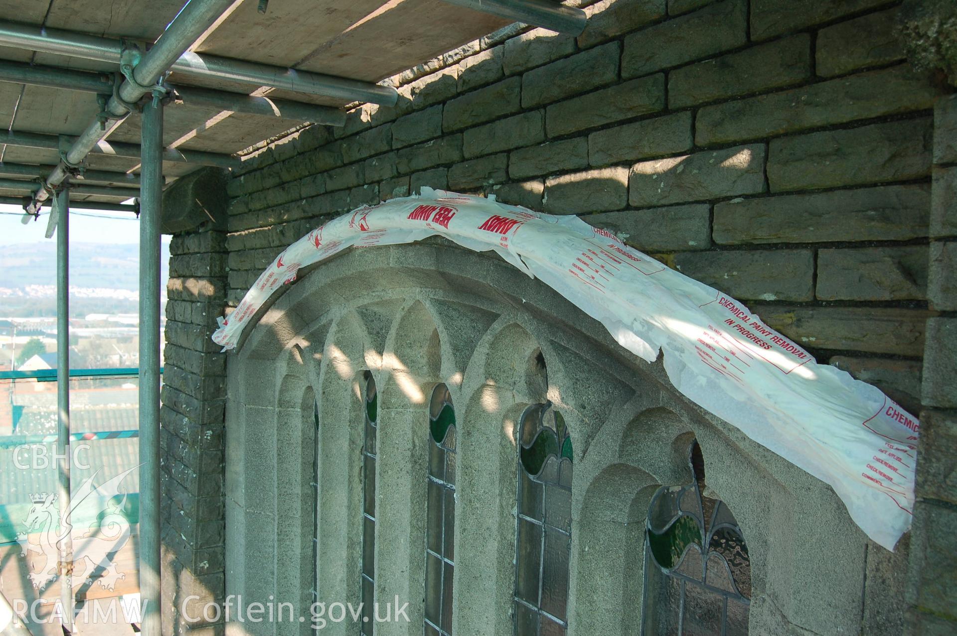 Digital colour photograph showing an exterior view of a window at the Van Road United Reformed Church, being renovated.