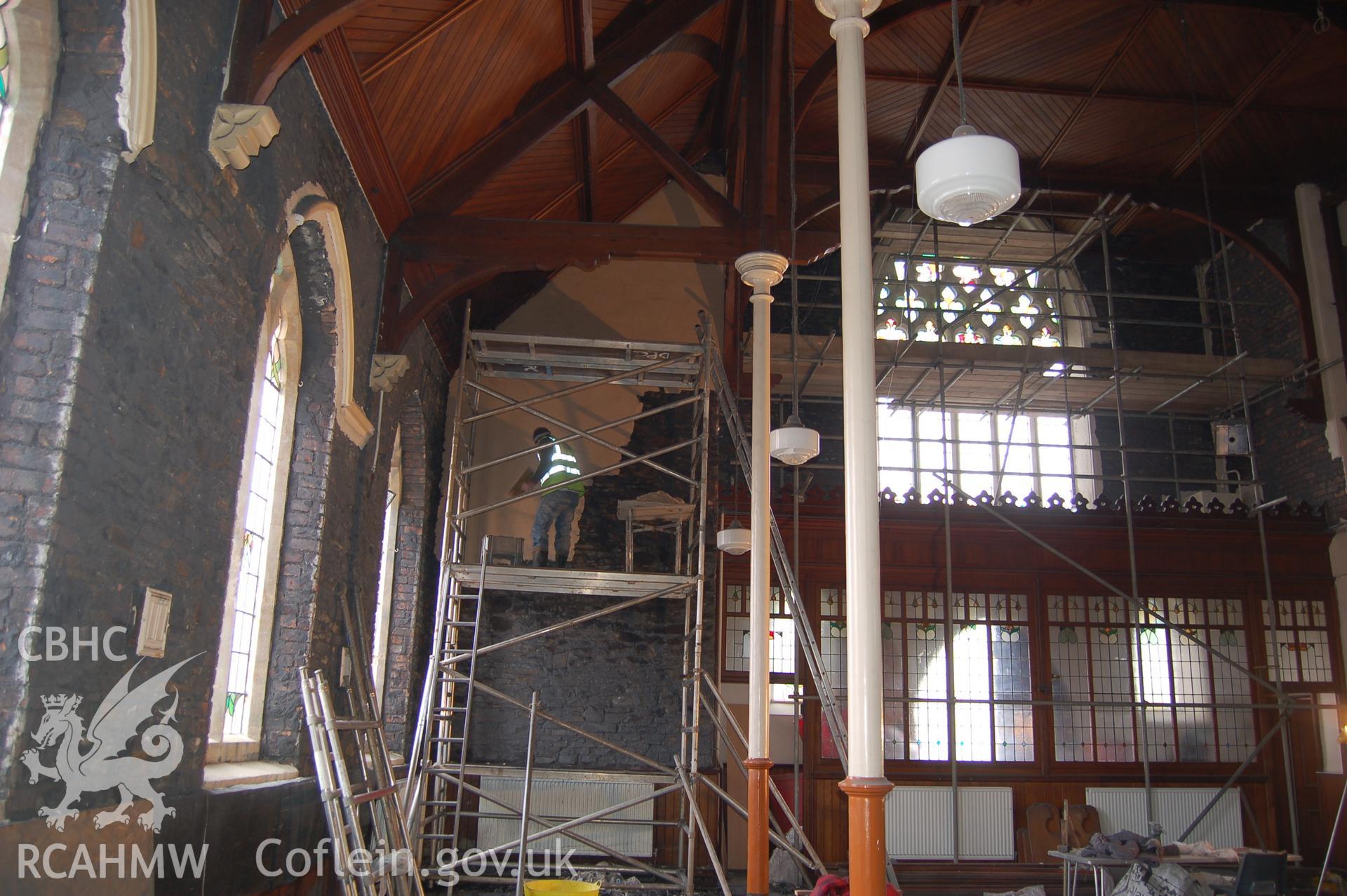 Digital colour photograph showing interior renovation work (plastering) during the second phase of restoration (2009-2010) of Van Road United Reformed Church.