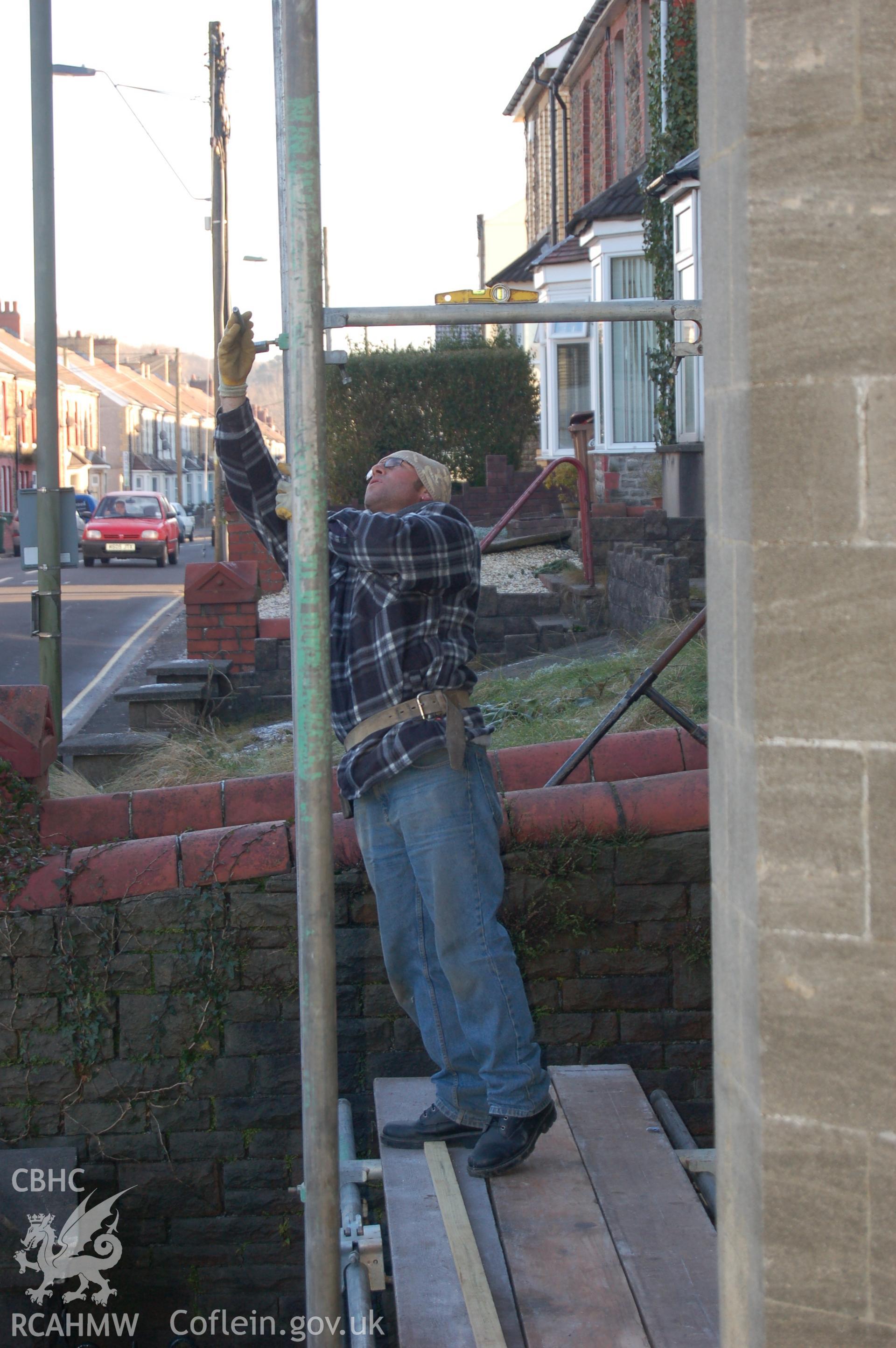 Digital colour photograph showing interior renovation work (exterior with workmen) during the second phase of restoration (2009-2010) of Van Road United Reformed Church.