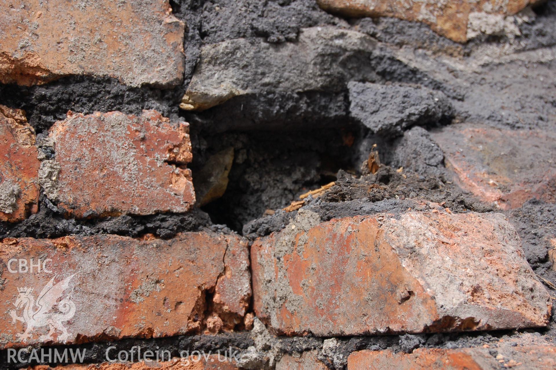 Digital colour photograph showing a detailed view of brickwork at the Van Road United Reformed Church, during renovation.