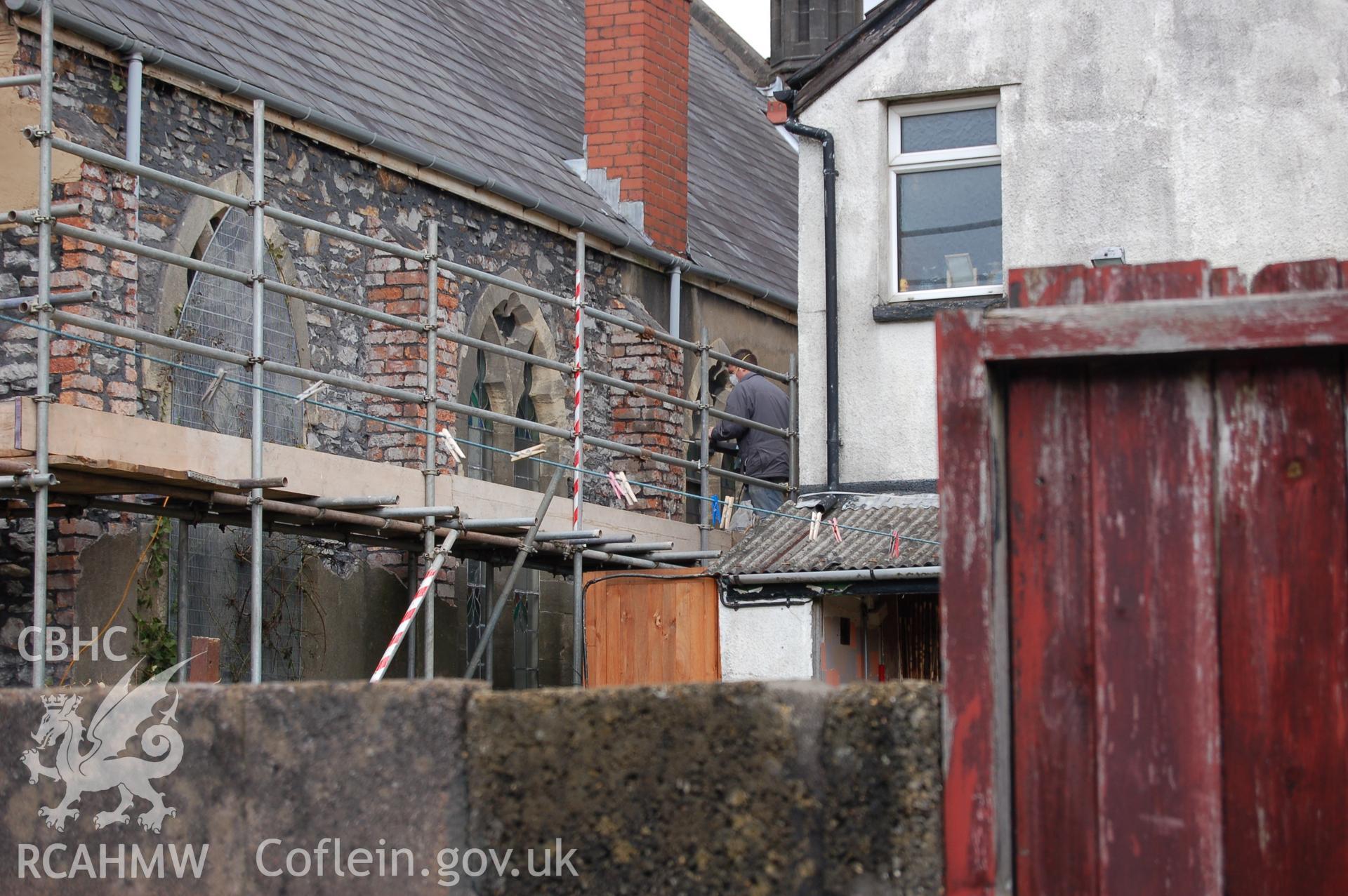 Digital colour photograph showing an elevation view of the Van Road United Reformed Church, during renovation.