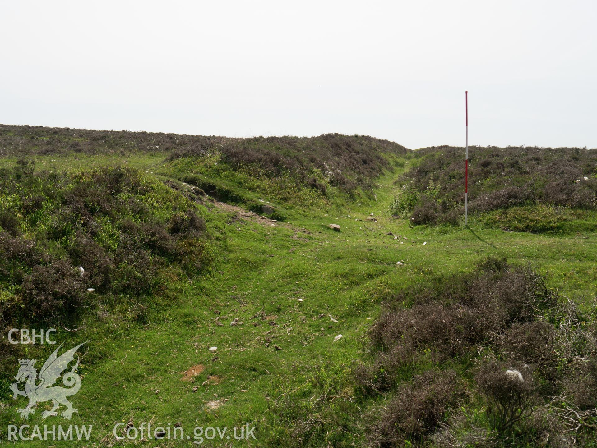 view looking SW, showing modern breach.