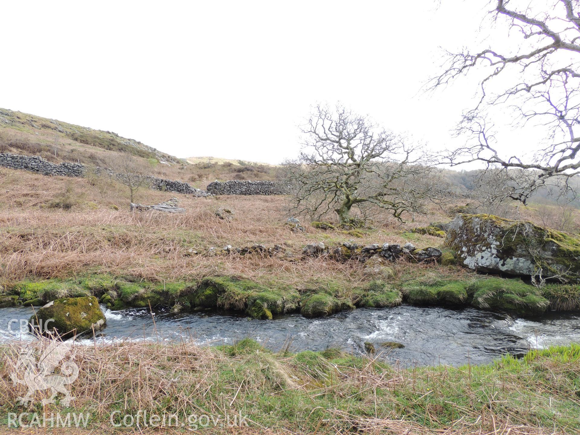 'View east from Turbine House area.' Photographed as part of desk based assessment and heritage impact assessment of a hydro scheme on the Afon Croesor, Brondanw Estate, Gwynedd. Produced by Archaeology Wales for Renewables First Ltd. 2018.