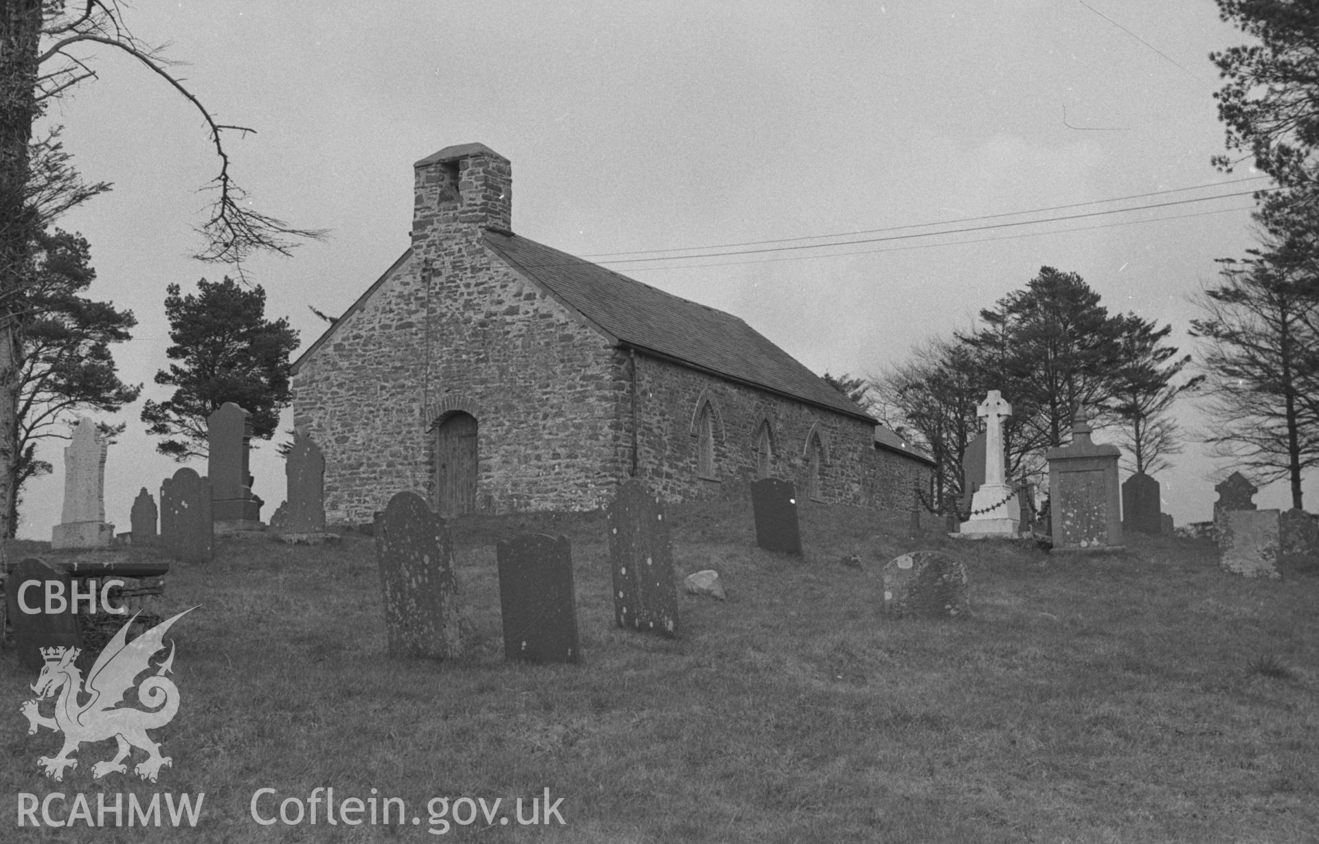 Digital copy of a black and white negative showing exterior view of St. Padarns church, Llanbadarn Odyn. Photographed in April 1964 by Arthur O. Chater from Grid Reference SN 6341 6047, looking north east.