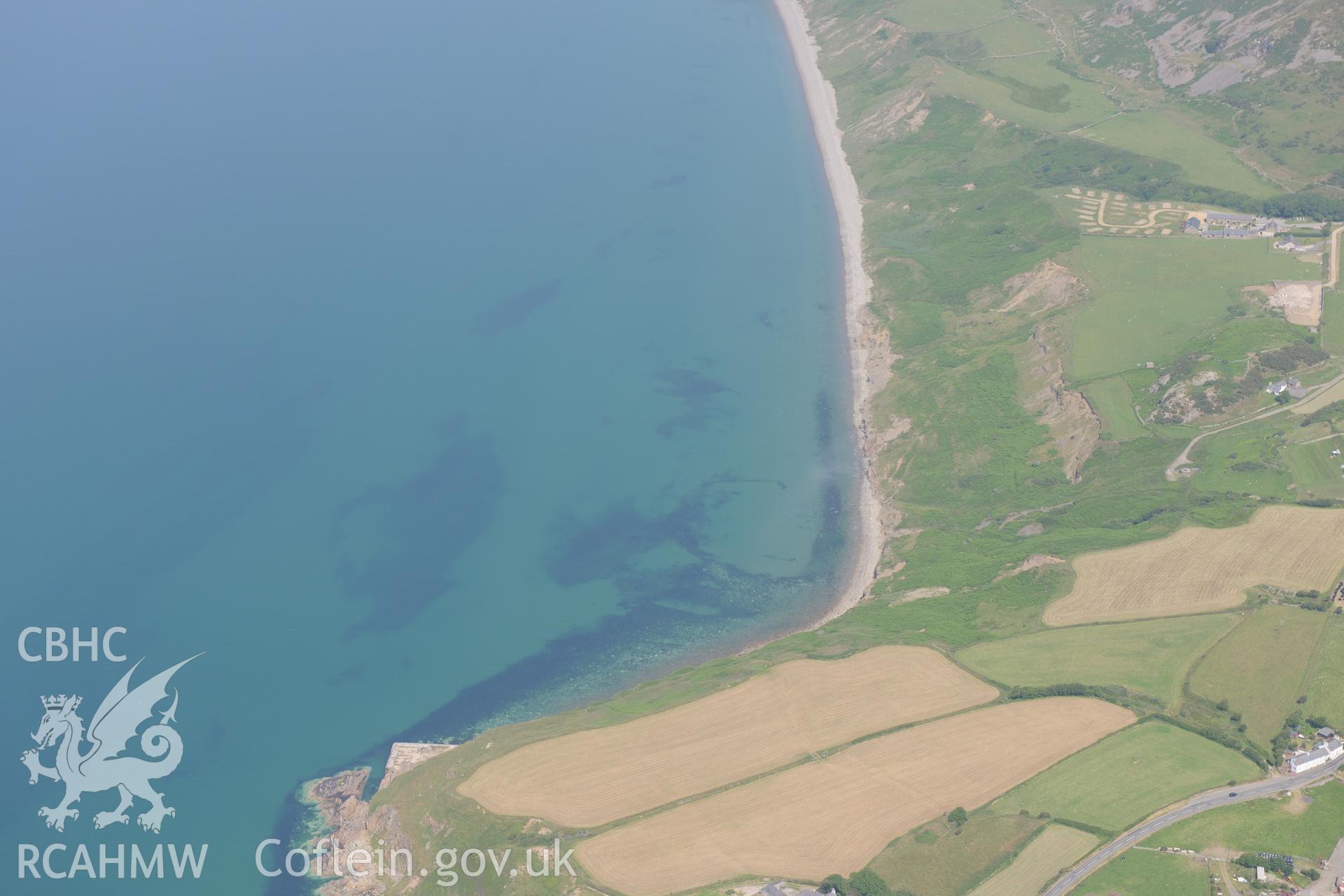 Boulder Bank fish trap, off the northern coast of the Lleyn Peninsula at Nefyn. Oblique aerial photograph taken during the Royal Commission?s programme of archaeological aerial reconnaissance by Toby Driver on 12th July 2013.