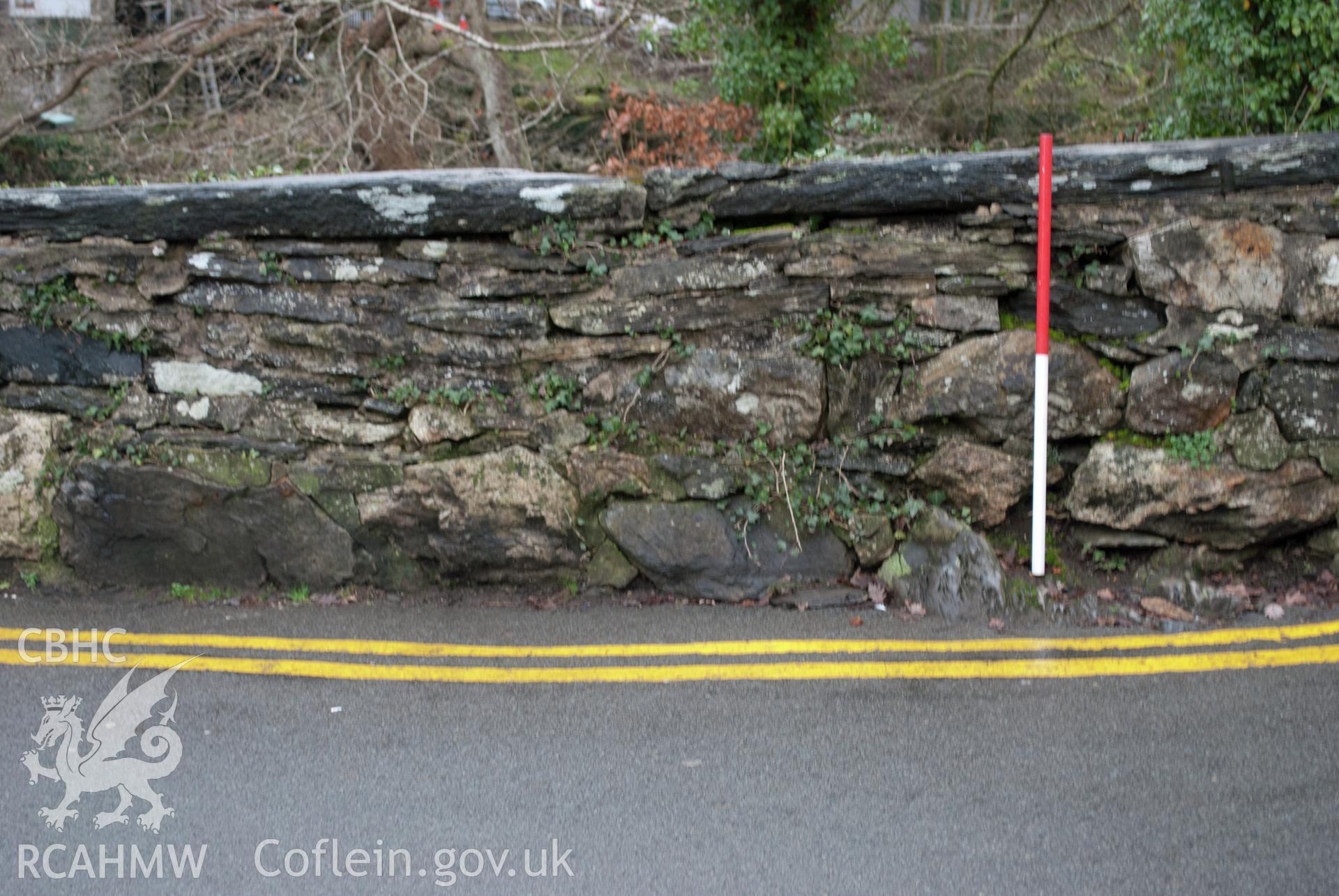 View of damaged coping stone at northwest corner of Pont y Pair. Digital photograph taken for Archaeological Watching Brief at Pont y Pair, Betws y Coed, 2019. Gwynedd Archaeological Trust Project ref G2587.