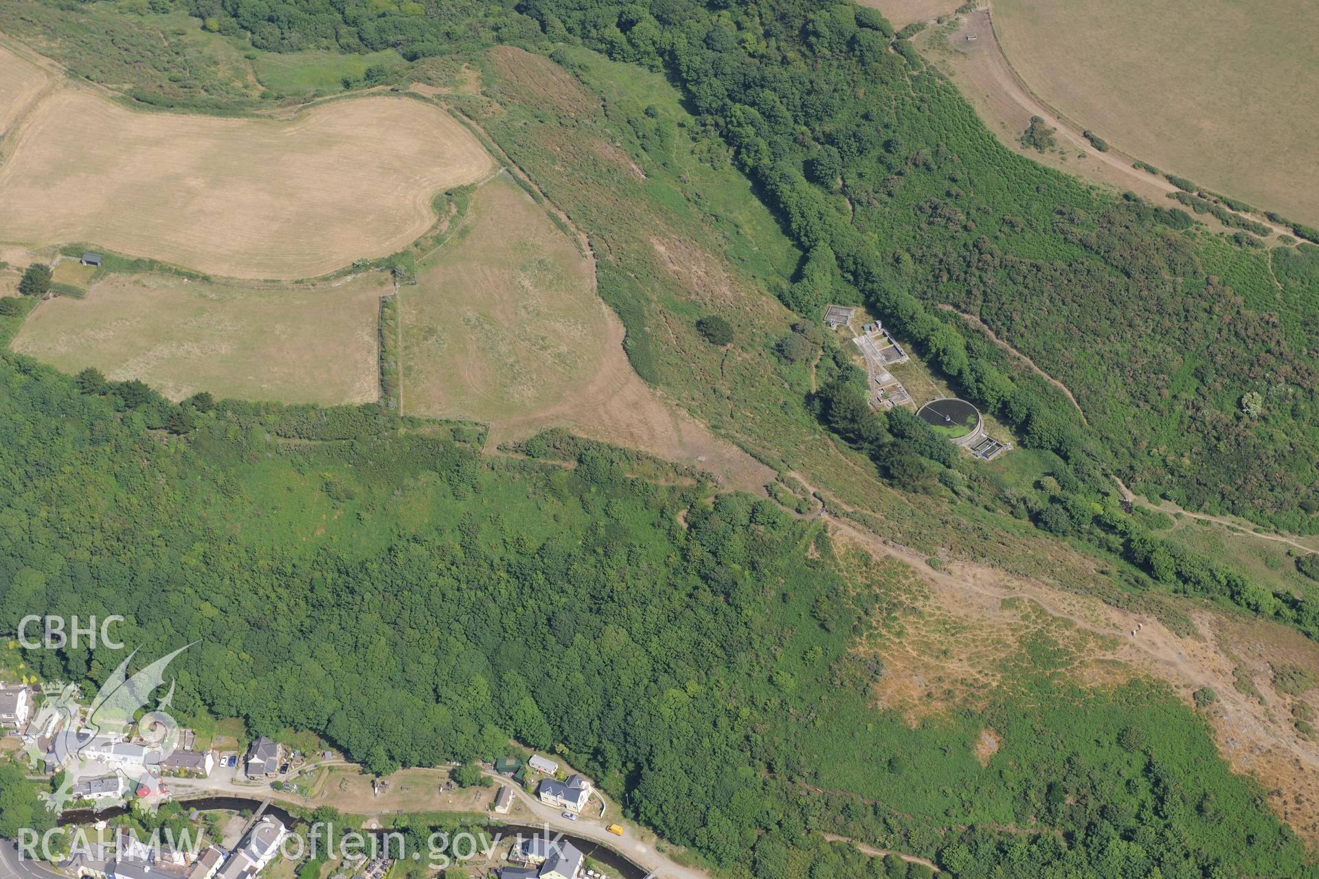 Defended enclosure at Solva. Oblique aerial photograph taken during the Royal Commission?s programme of archaeological aerial reconnaissance by Toby Driver on 16th July 2013.