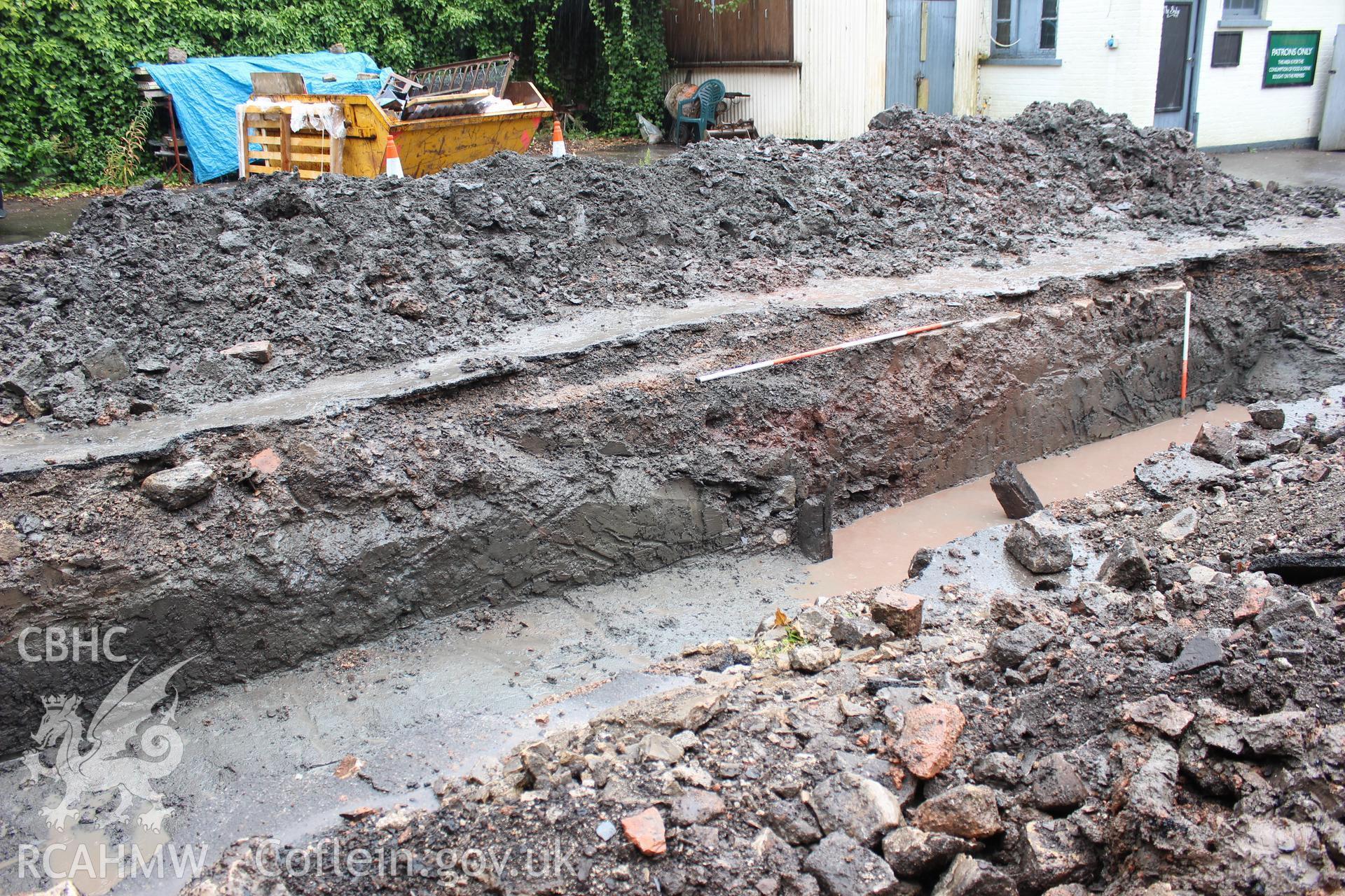 Shot of trench section. Photographed as part of an Archaeological Evaluation of The Bridge Inn, Chepstow, carried out by Archaeology Wales, 2015.