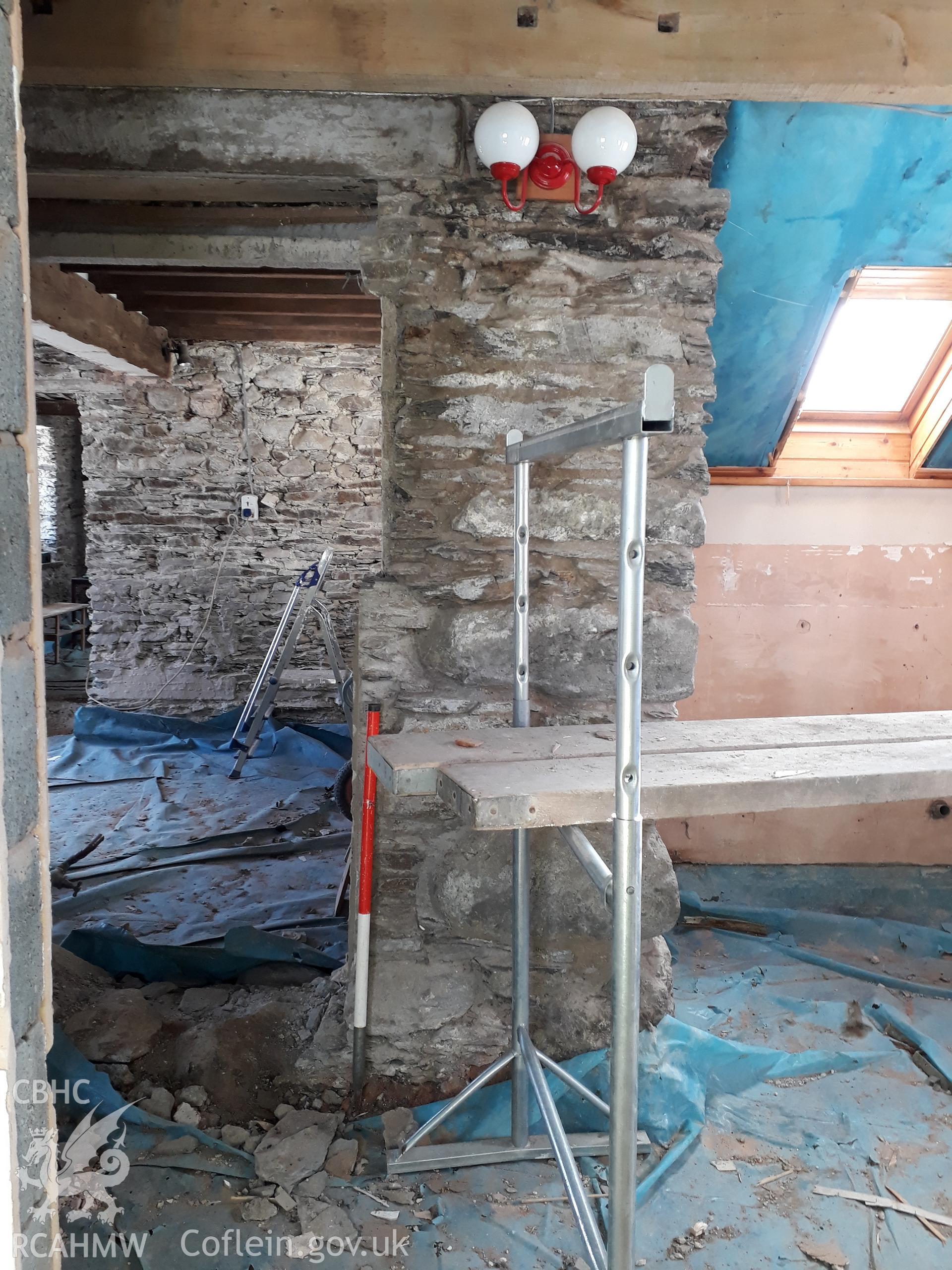 Original western corner of the house, now incorporated into the modern extension, view south-east. Photographed for archaeological building recording conducted at Bryn Ysguboriau, Llanelidan, Denbighshire, carried out by Archaeology Wales, 2018.