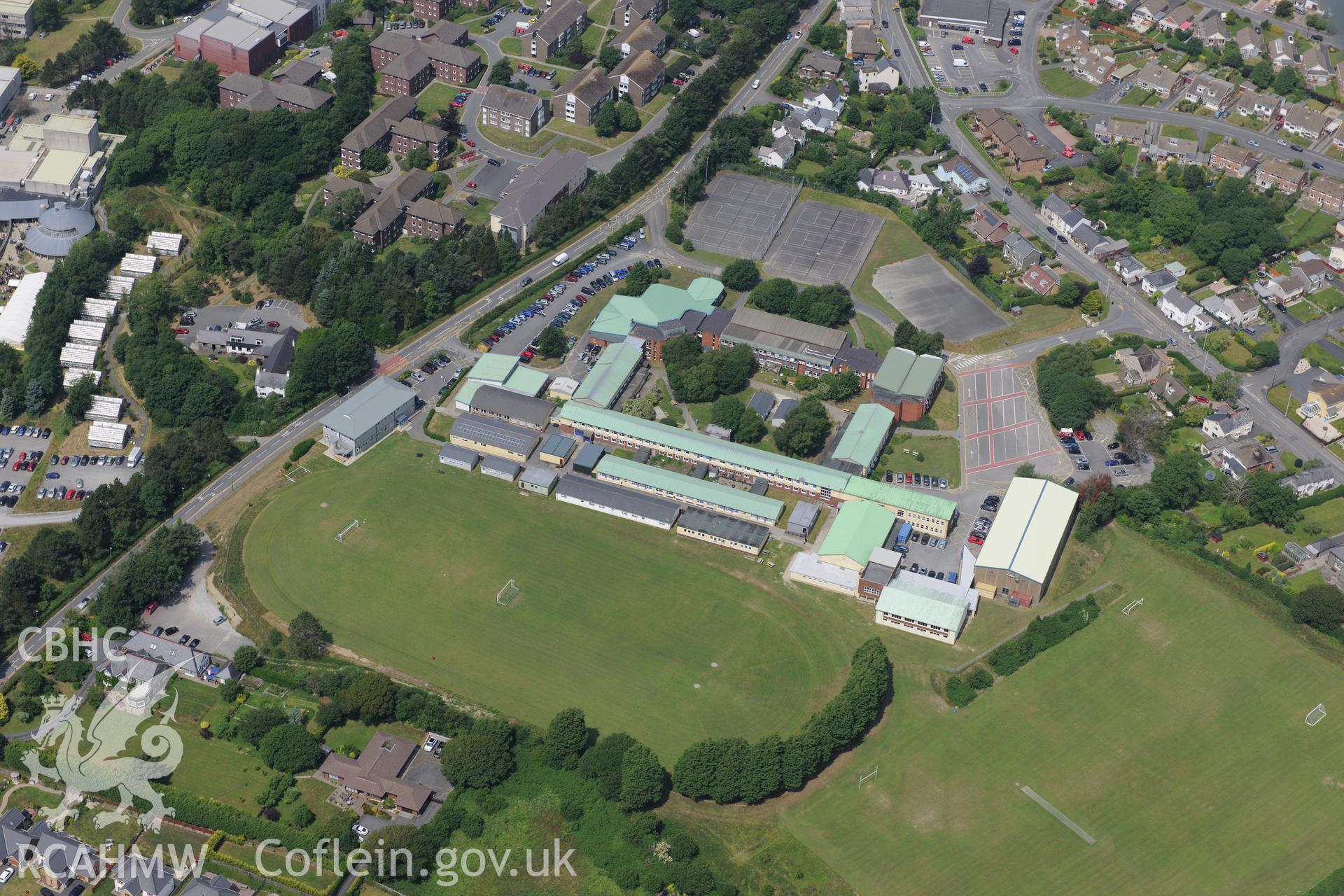 Penglais Comprehensive School, Aberystwyth. Oblique aerial photograph taken during the Royal Commission?s programme of archaeological aerial reconnaissance by Toby Driver on 12th July 2013.