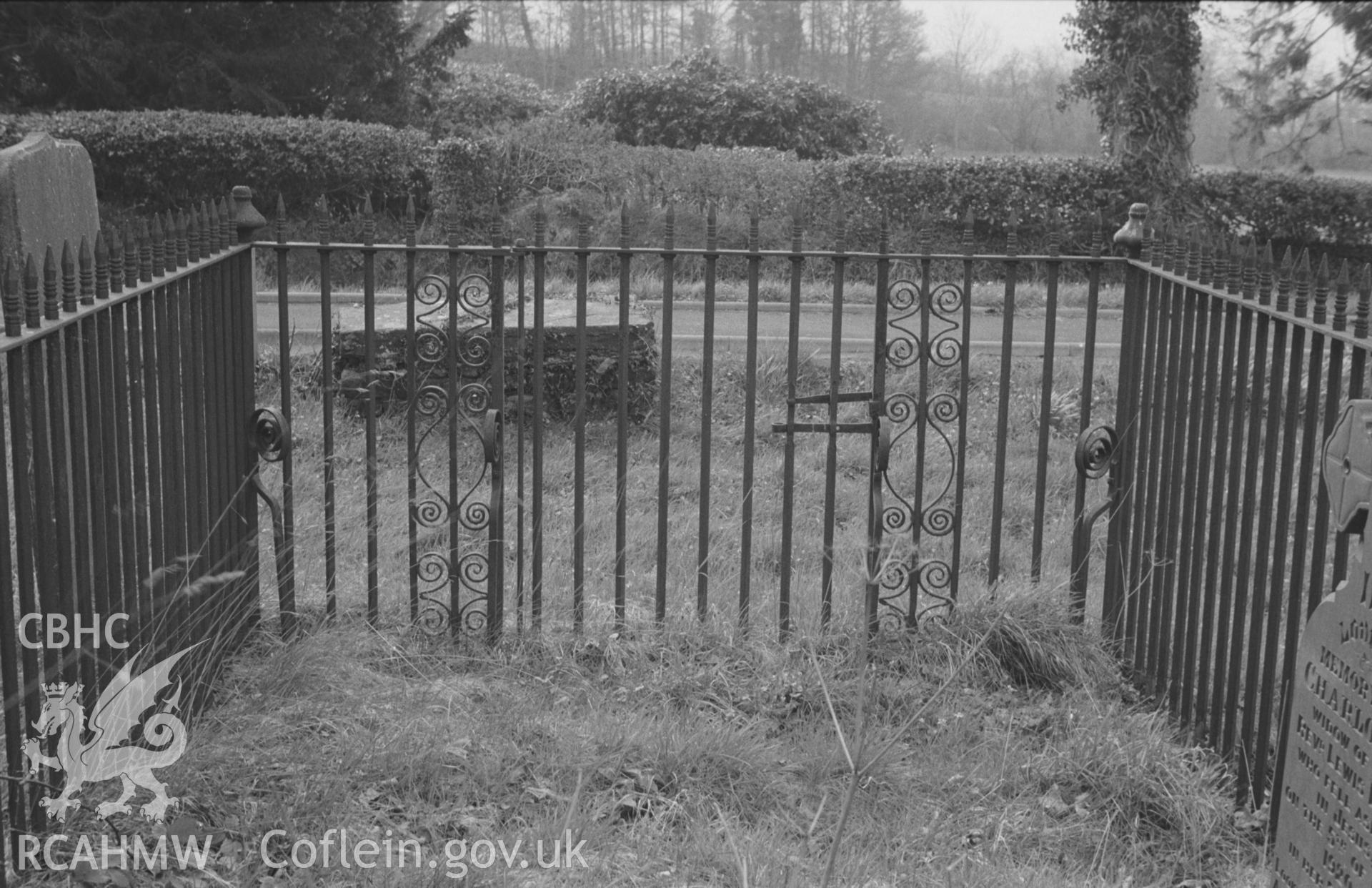 Digital copy of a black and white negative showing wrought iron grave enclosures in churchyard at St Hilary's Church, Trefilan. Photographed by Arthur O. Chater on 11th April 1967 from Grid Reference SN 550 572.