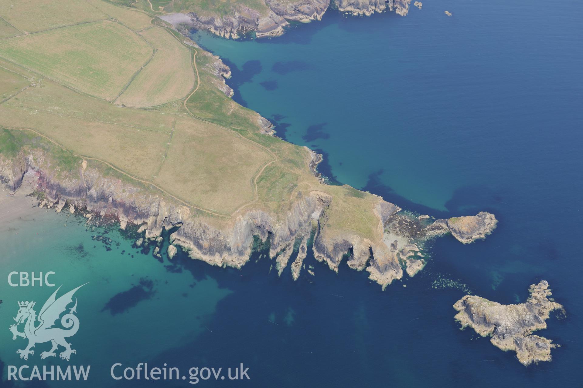 Caerfai Promontory Fort, St Davids. Oblique aerial photograph taken during the Royal Commission?s programme of archaeological aerial reconnaissance by Toby Driver on 16th July 2013.