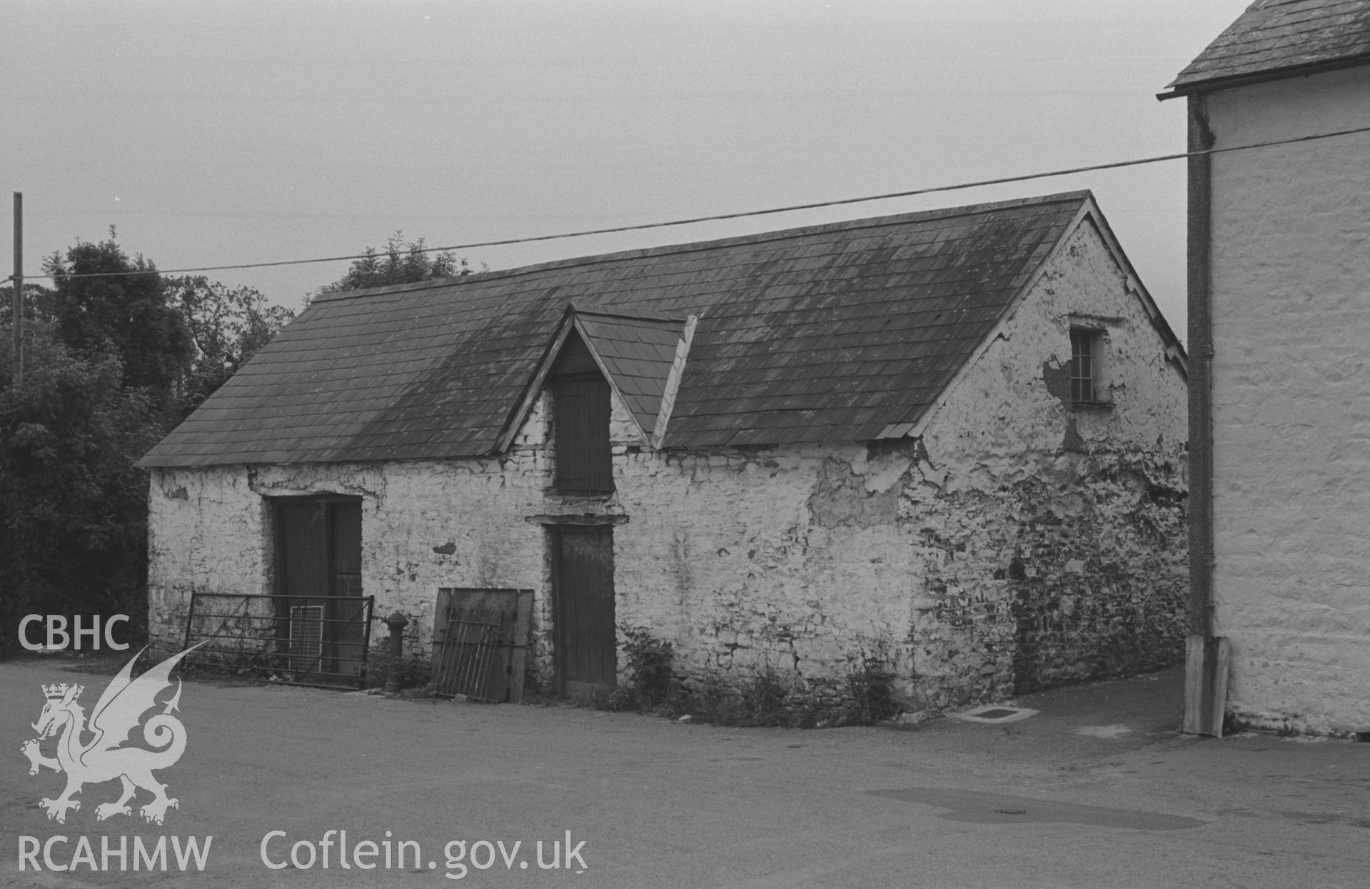Digital copy of a black and white negative showing building on the west side of the road at the south end of Talsarn, south east of Aberaeron. Photographed by Arthur O. Chater on 5th September 1966 looking south west from Grid Reference SN 545 563.