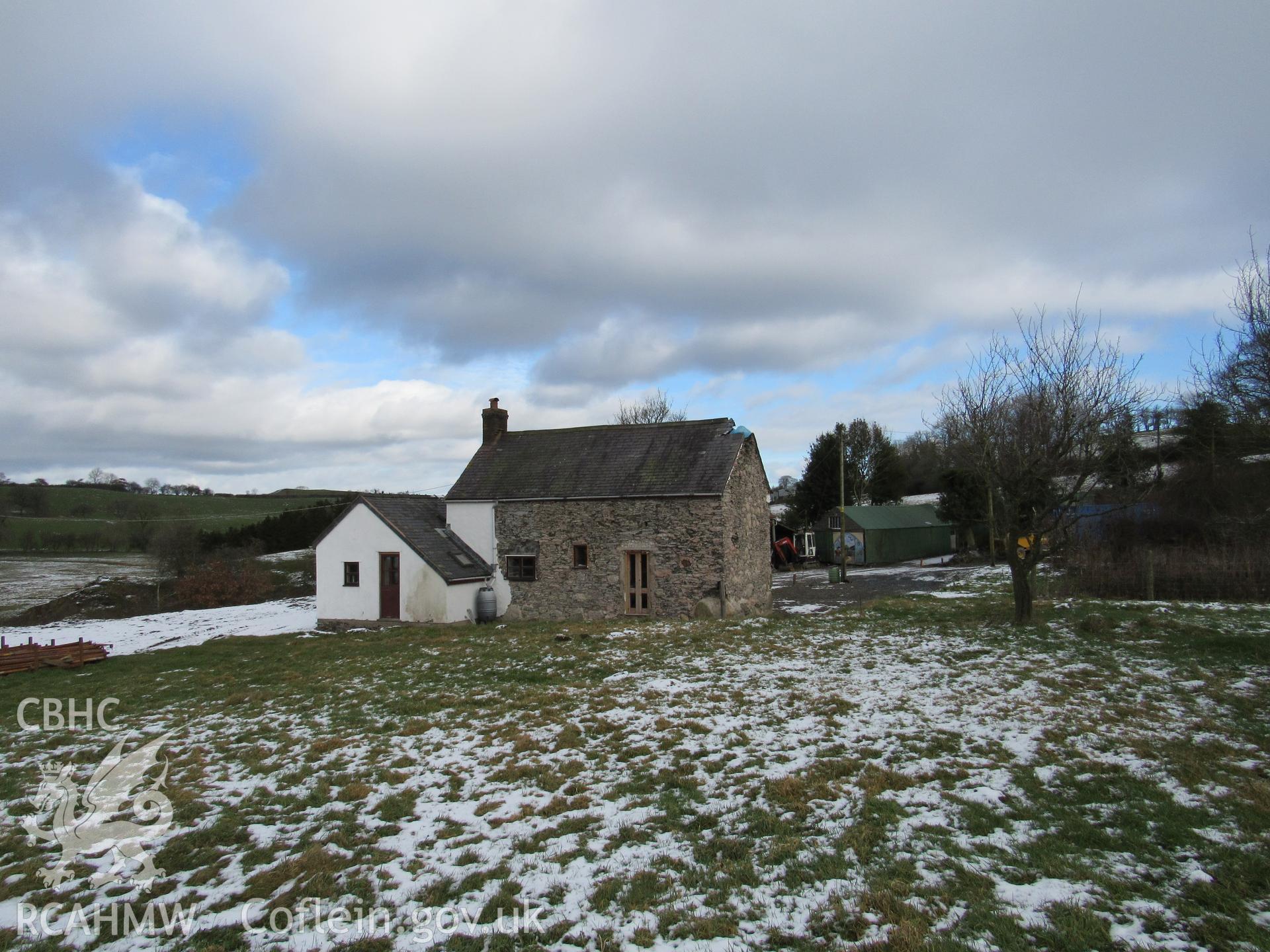 The rear of the house with modern extension, view north-east. Photographs as part of archaeological building recording conducted at Bryn Ysguboriau, Llanelidan, Denbighshire, carried out by Archaeology Wales, 2018. Project no. P2587.