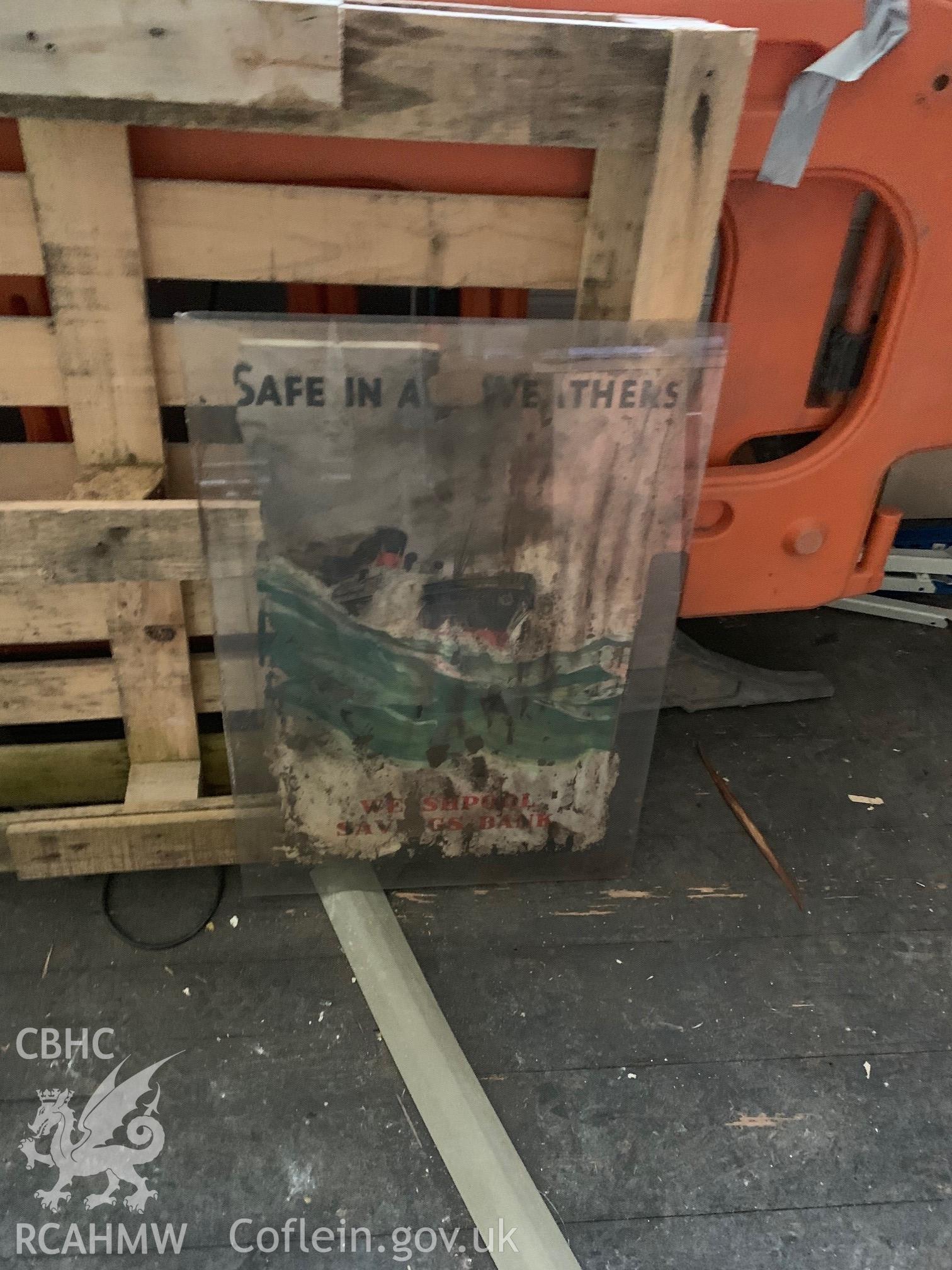 Digital colour photograph showing poster advertising Welshpool Savings Bank. Photographed as part of CPAT Project 2351: 2 Severn Street, Welshpool, Powys - Archaeological Watching Brief, 2019. Report no. 1663.