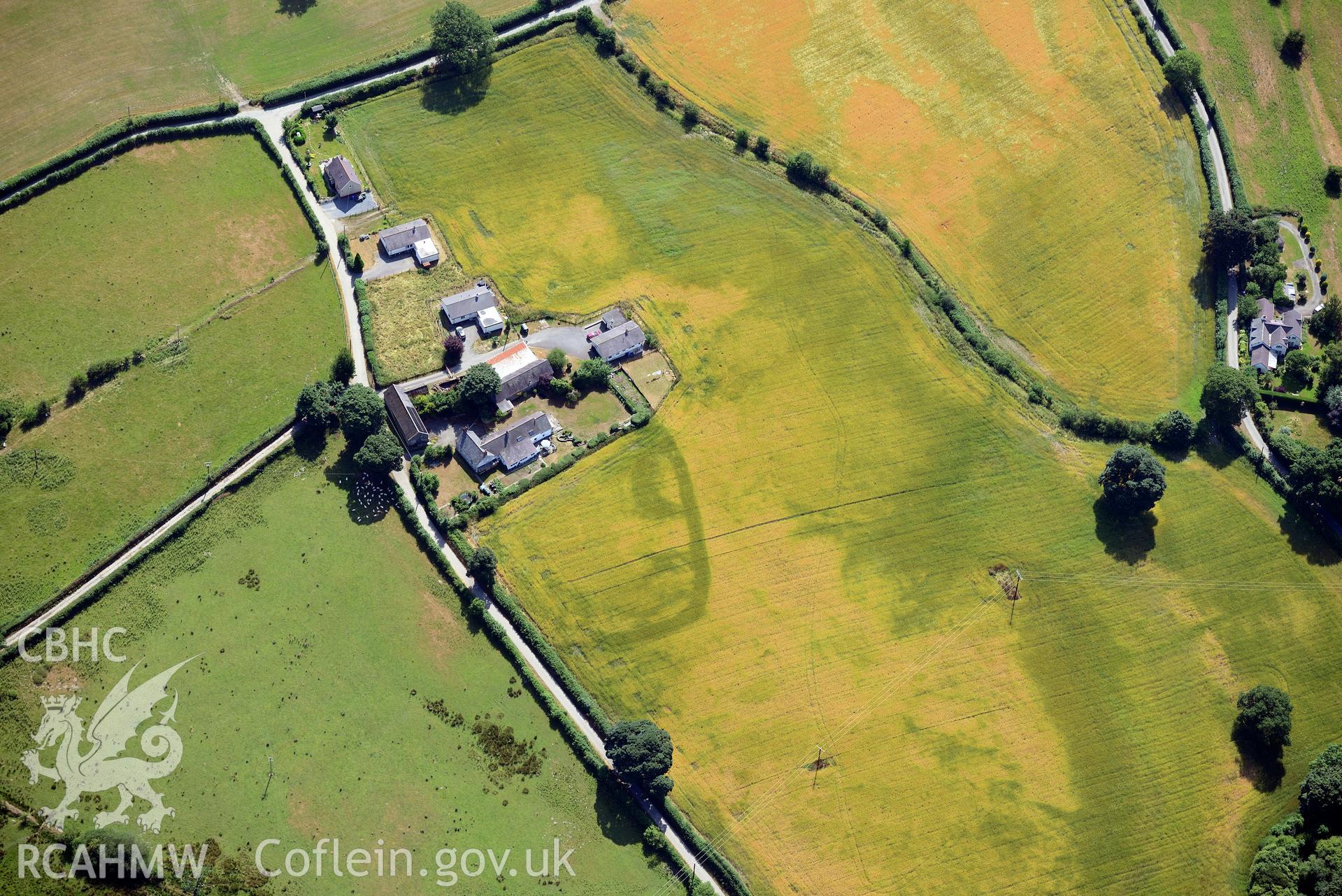 Royal Commission aerial photography of Plas Adda defended enclosure cropmarks taken on 19th July 2018 during the 2018 drought.