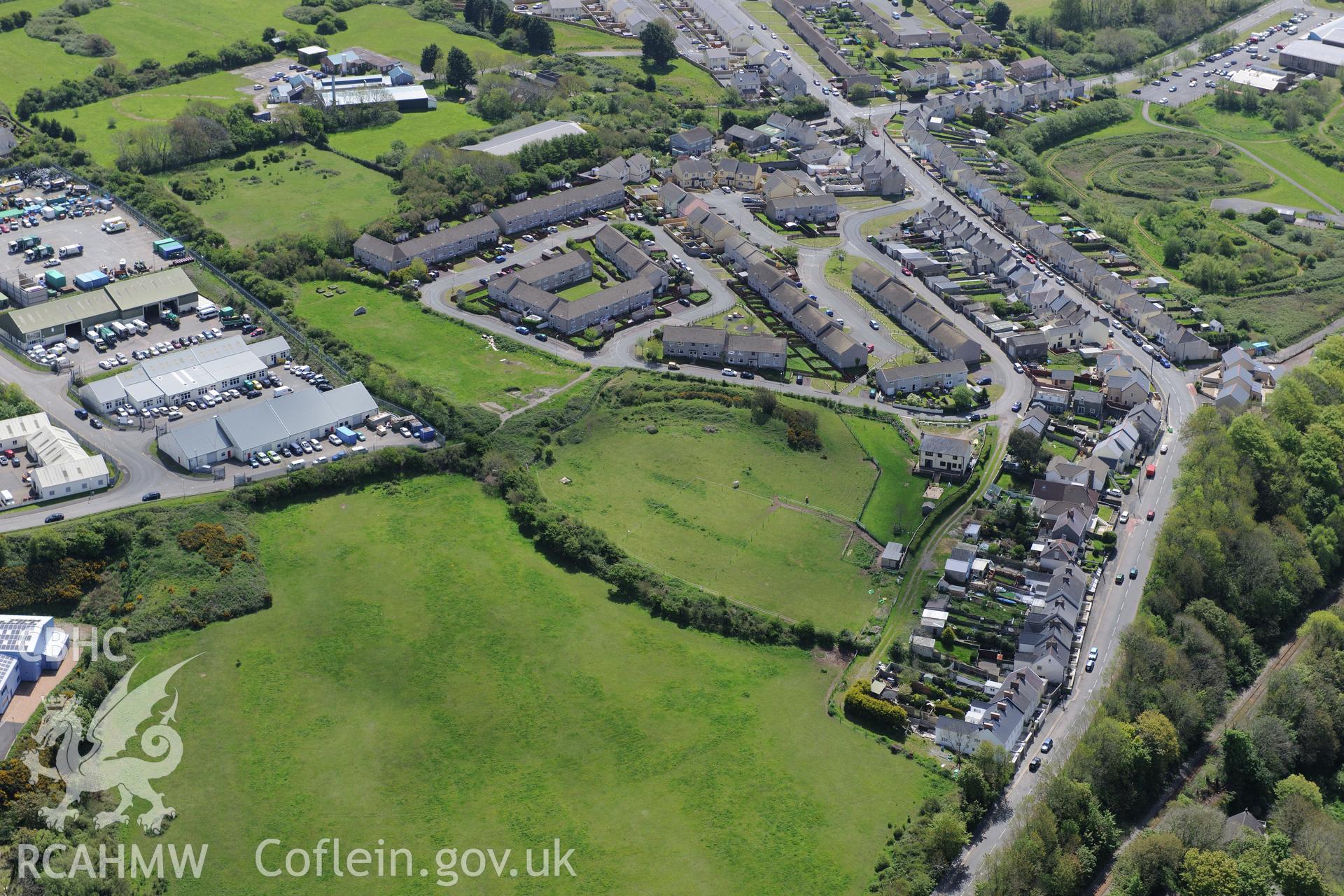 Priory Rath defended enclosure, Milford Haven, Pembrokeshire. Oblique aerial photograph taken during the Royal Commission's programme of archaeological aerial reconnaissance by Toby Driver on 13th May 2015.