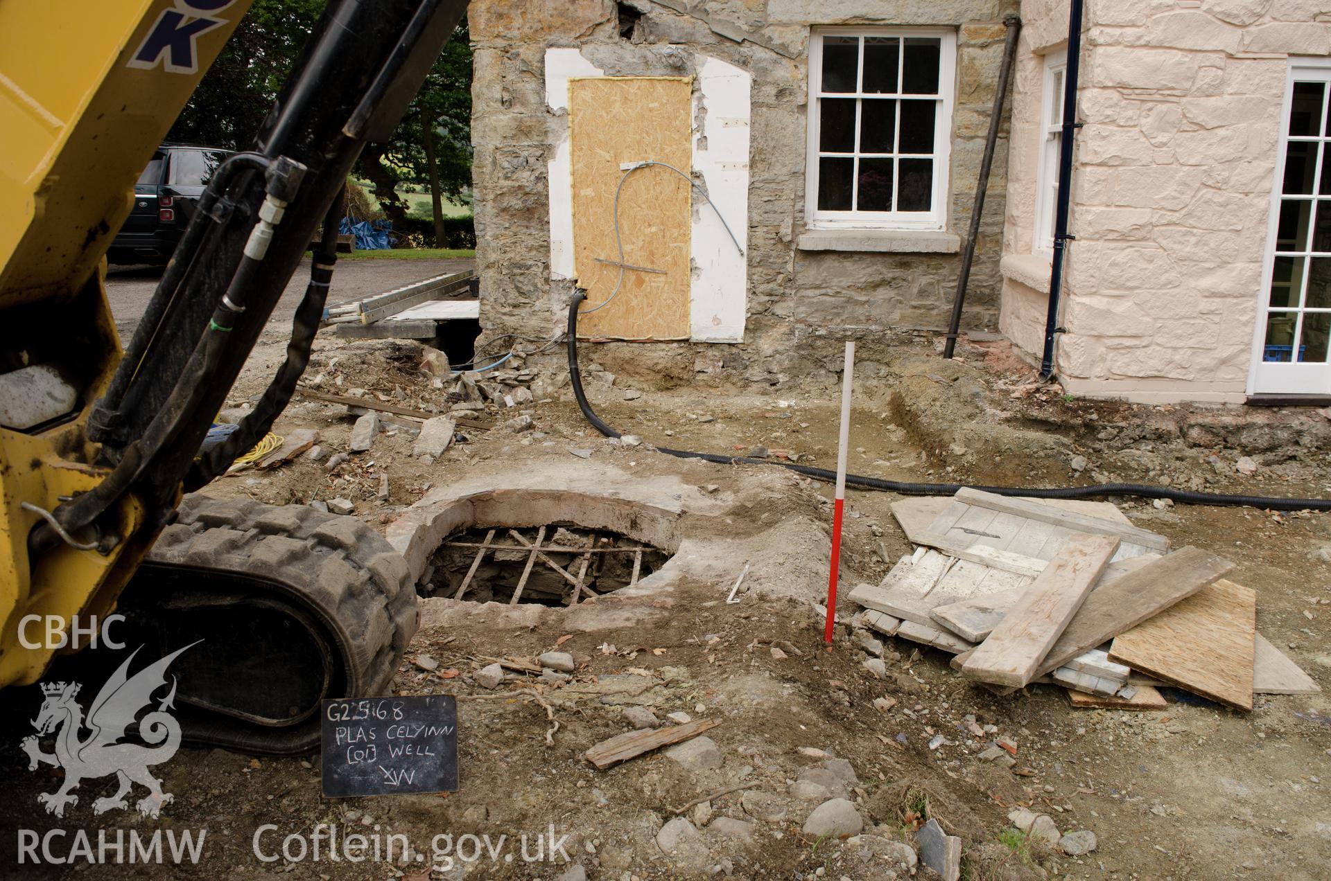 'Location shot of the well, view from the north north east.' Photographed by Gwynedd Archaeological Trust as part of archaeological mitigation report for well at Plas Celynin, Henryd, Conwy, on 1st August 2018. Project no. G2568.