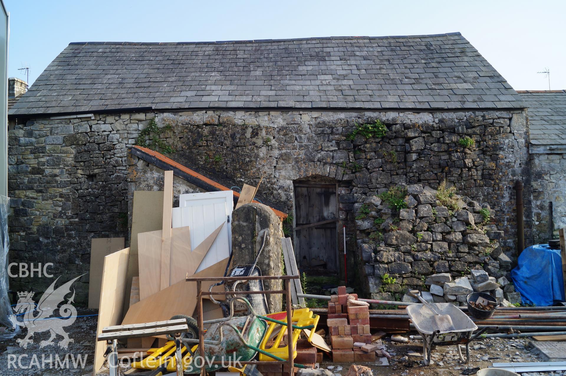 View 'looking south southeast from the northern side of the building, looking at the main barn, buttress and outdoor toilet' at Rowley Court, Llantwit Major. Photograph & description by Jenny Hall & Paul Sambrook of Trysor, 7th September 2016.