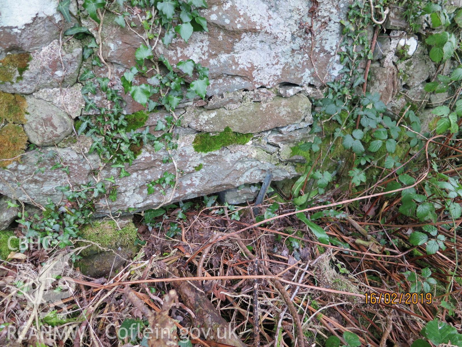 Exterior north elevation drain aperture of the pigsty at Pencerrig Pellaf, Ffordd Uchaf, Harlech. Photographed by Kimberley Urch as part of photographic survey for planning application (ref. no. NP5/61/LB446A Snowdonia National Park Authority).