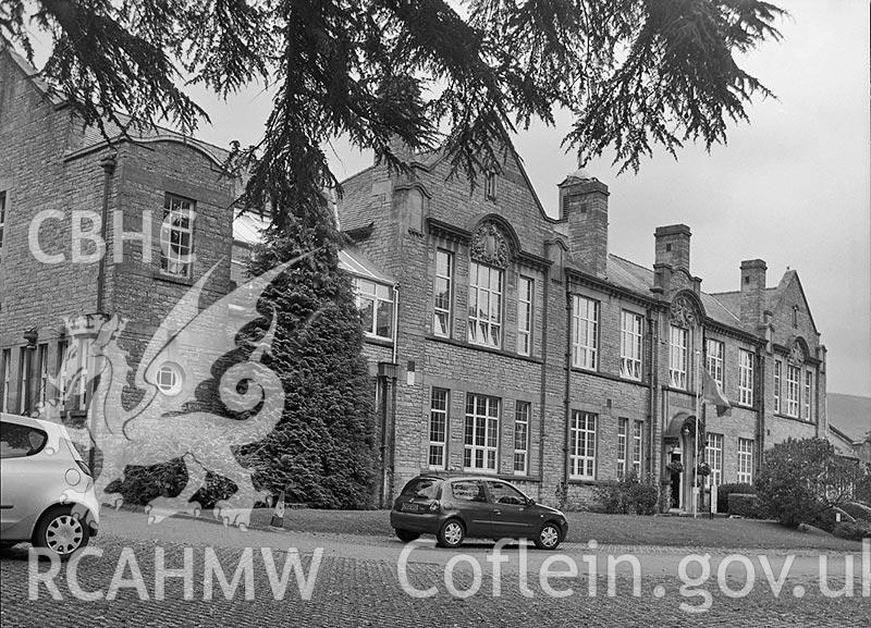 Digitised black and white photograph showing front elevation of the 'Girls' Intermediate School, Aberdare,' dated 2014. Included in material associated with building recording conducted by Archaeology Wales, February 2018.