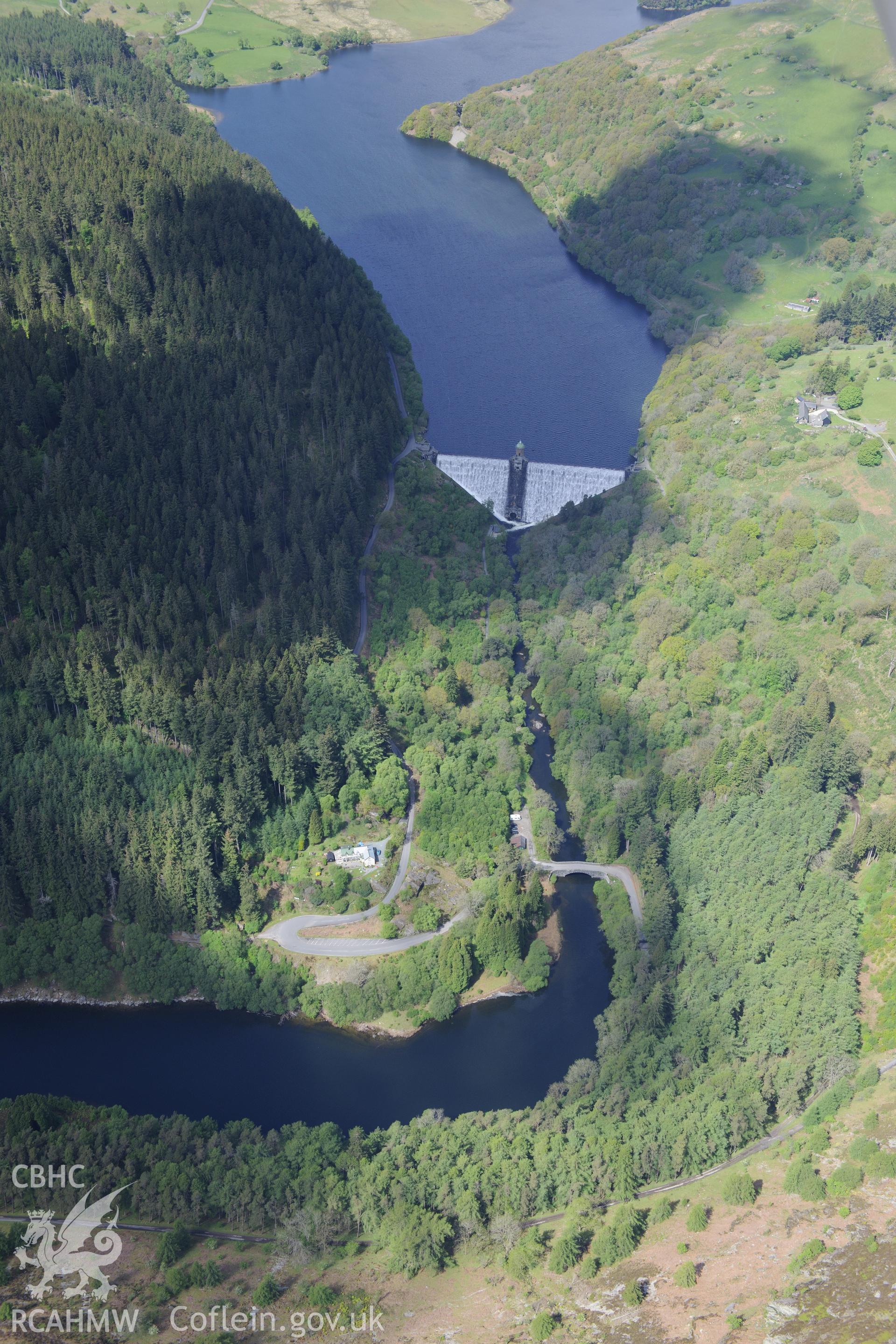Pen-y-Garreg reservoir, dam and valve tower, pont Myllfan bridge and Pen-y-Bont house. Oblique aerial photograph taken during the Royal Commission's programme of archaeological aerial reconnaissance by Toby Driver on 3rd June 2015.