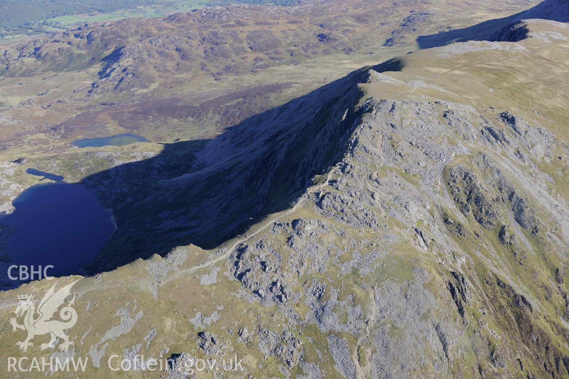 Penygadair - the summit of Cadair Idris. Oblique aerial photograph taken during the Royal Commission's programme of archaeological aerial reconnaissance by Toby Driver on 2nd October 2015.
