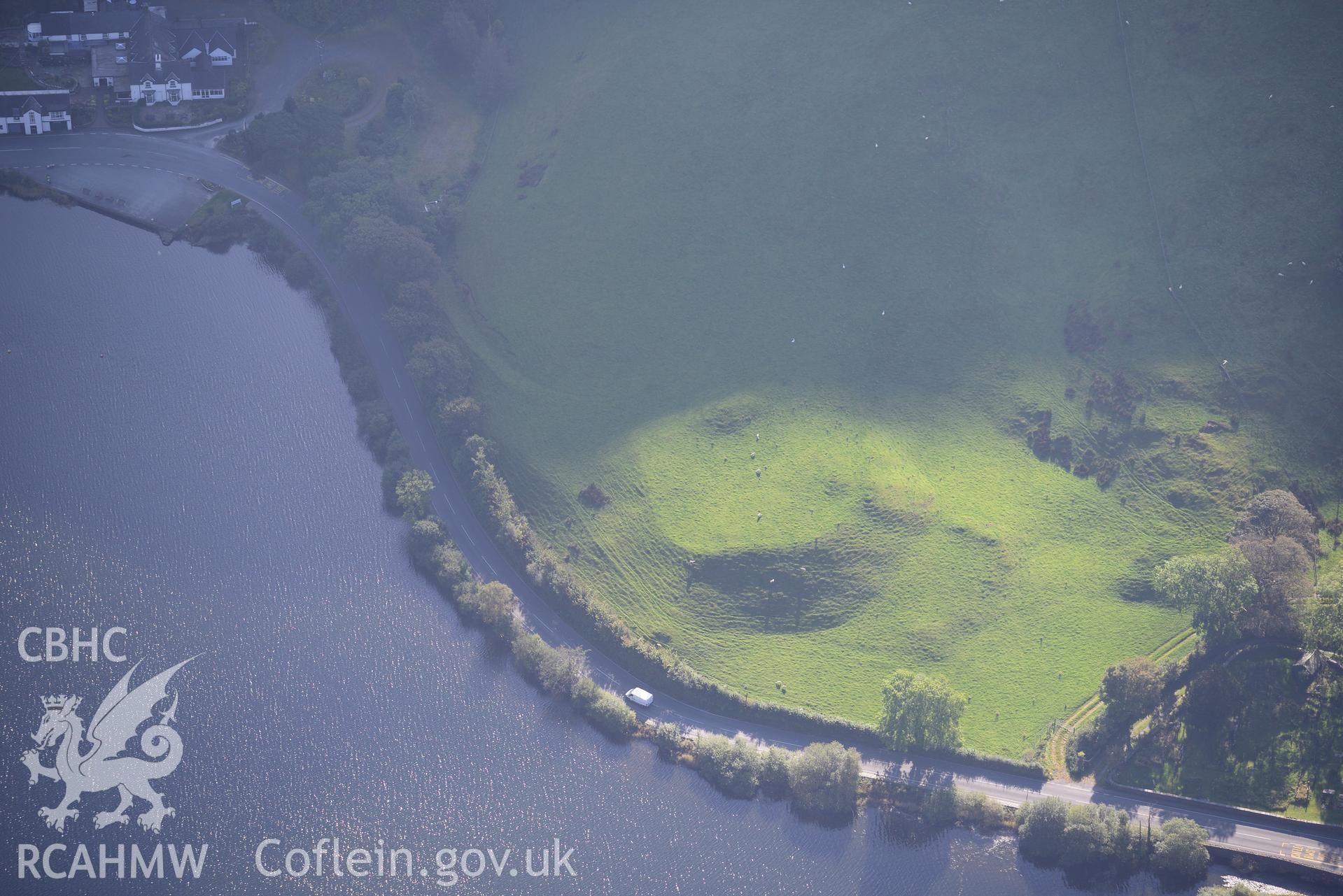 Ty'n-y-Cornel Hotel and Tal-y-Llyn enclosure or Roman fortlet, on the banks of Tal-y-Llyn lake, near Corris. Oblique aerial photograph taken during the Royal Commission's programme of archaeological aerial reconnaissance by Toby Driver on 2nd October 2015.