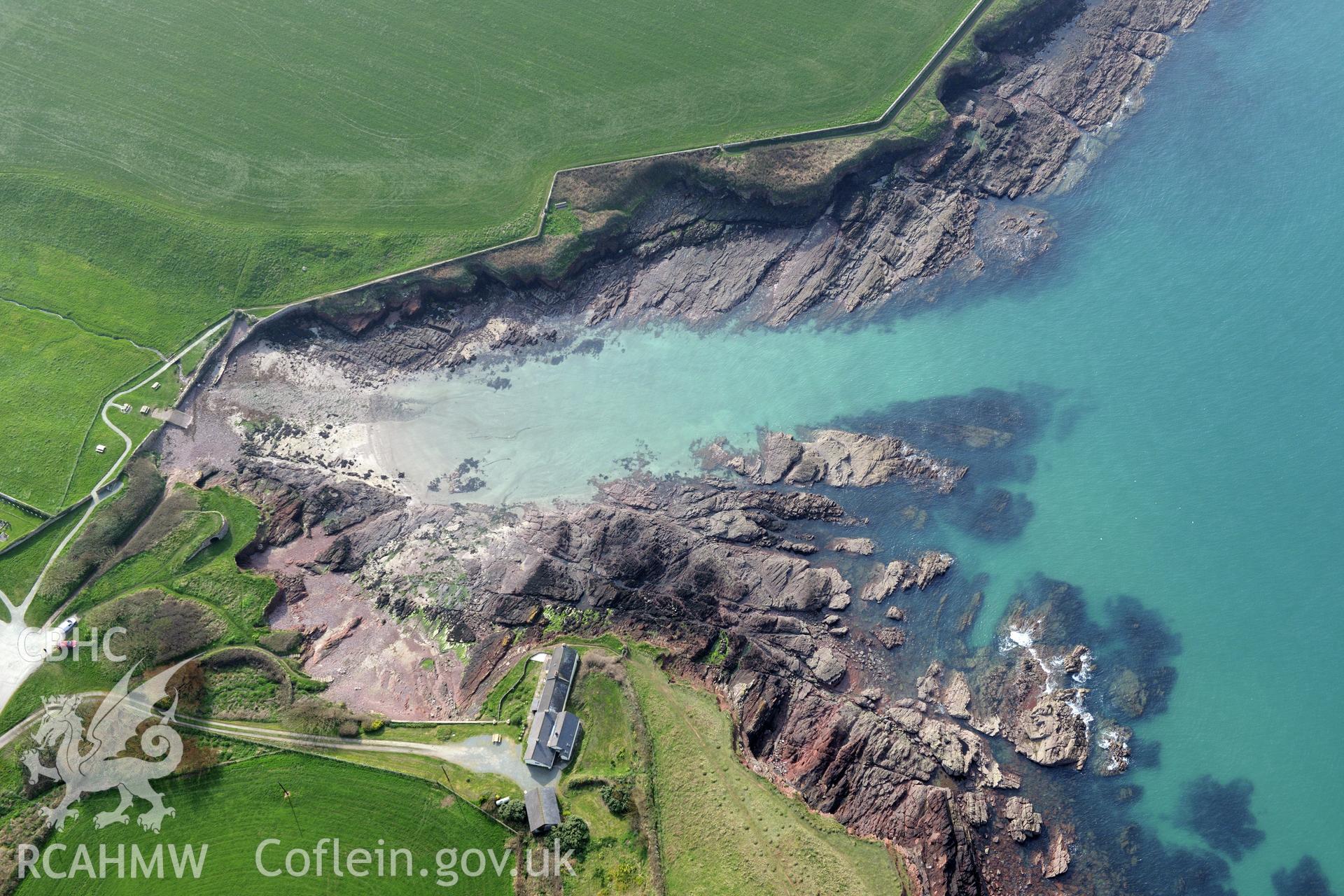 Royal Commission aerial photograph of St Bride's Haven taken on 27th March 2017. Baseline aerial reconnaissance survey for the CHERISH Project. ? Crown: CHERISH PROJECT 2017. Produced with EU funds through the Ireland Wales Co-operation Programme 2014-2020. All material made freely available through the Open Government Licence.