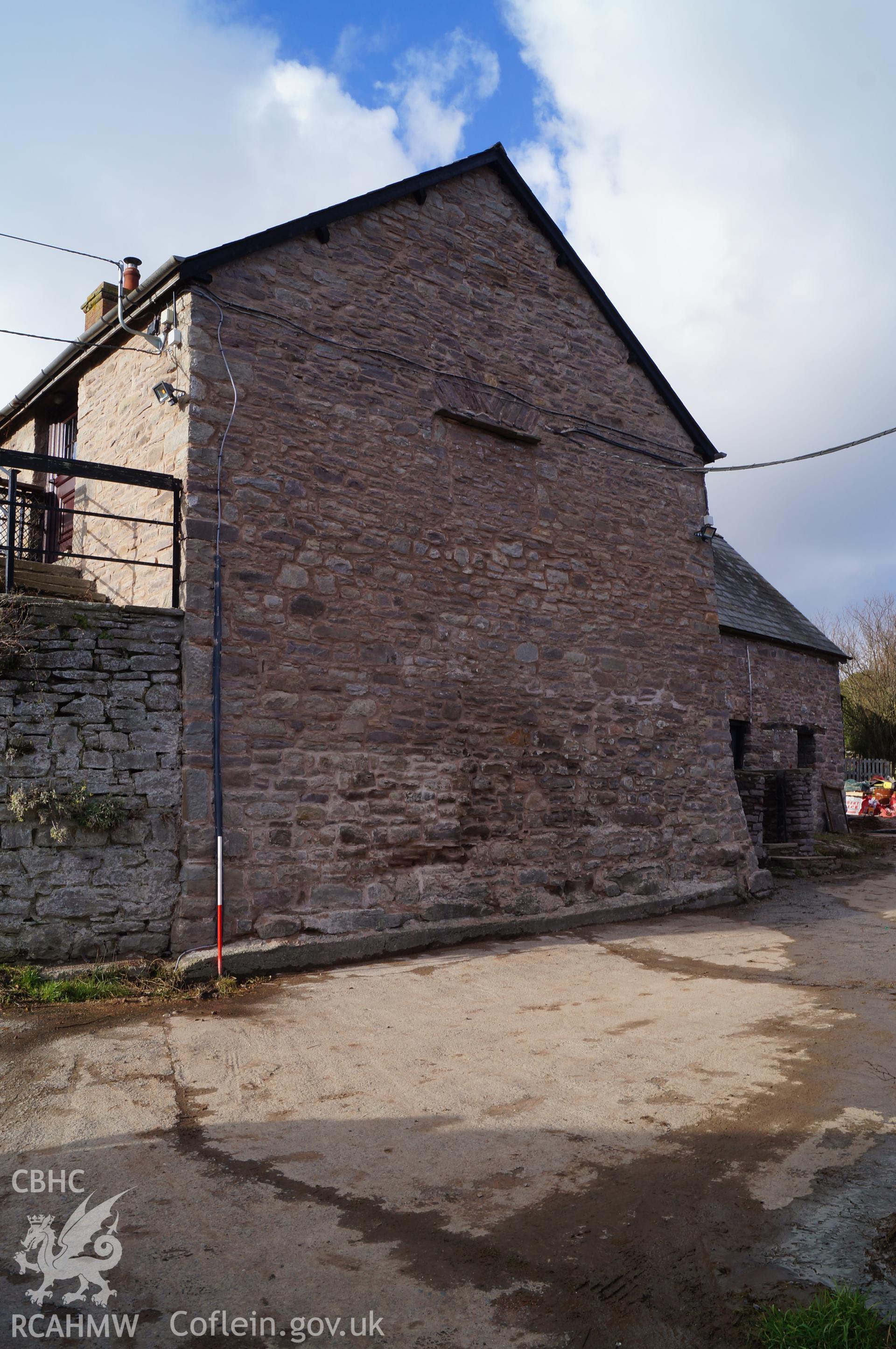 View 'looking north northwest at the southeastern gable of Gwrlodau farmhouse with the stable partially visible to the right of the photograph,' near Llanbedr, Crickhowell. Photograph and description by Jenny Hall and Paul Sambrook of Trysor, 9th Feb 2018.