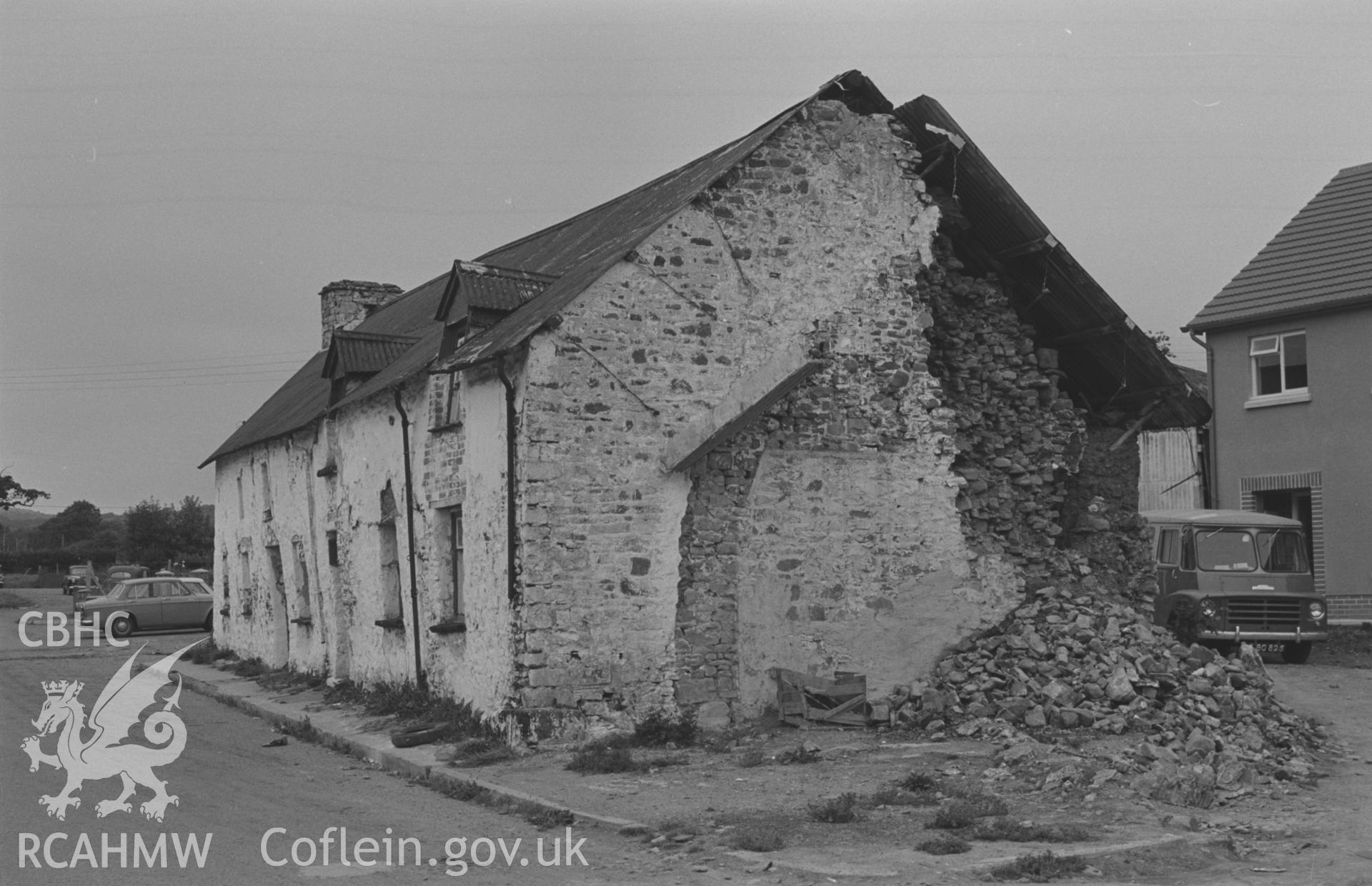 Digital copy of a black and white negative showing the old shop and cottages on the east side of the road at Talsarn, south east of Aberaeron. Photographed by Arthur O. Chater on 5th September 1966 looking north north east from Grid Reference SN 545 563.