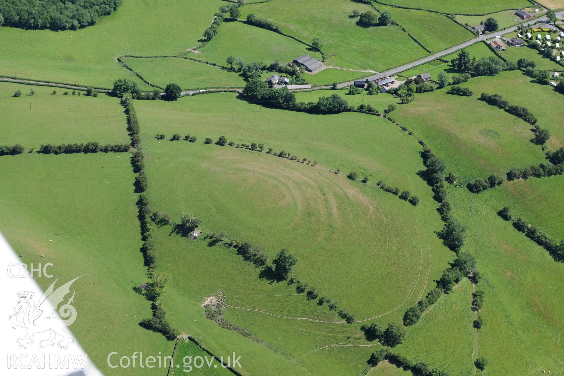 Pentre Camp defended enclosure, west of Welshpool. Oblique aerial photograph taken during the Royal Commission's programme of archaeological aerial reconnaissance by Toby Driver on 30th June 2015.