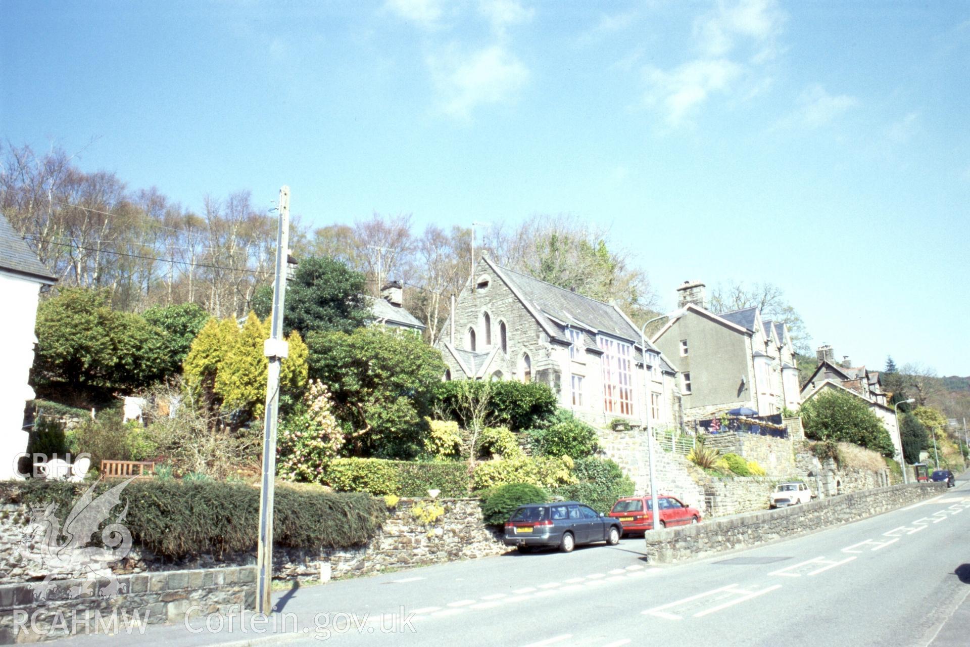 Exterior, more distant view, SW. gable & SE long wall.