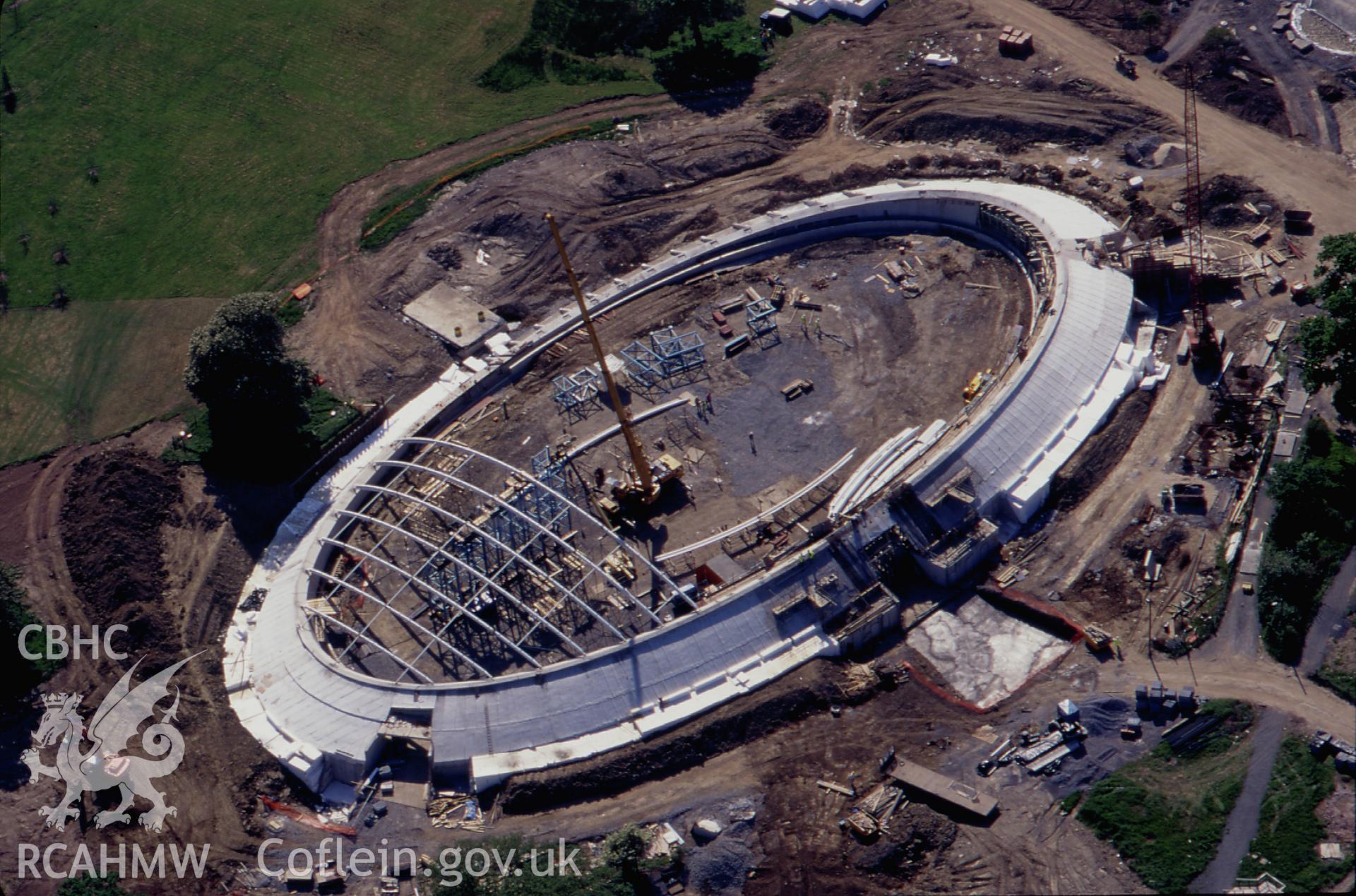 Slide of RCAHMW colour oblique aerial photograph of Glasshouse, National Botanic Gardens under construction, taken by T.G. Driver, 18/5/1998.