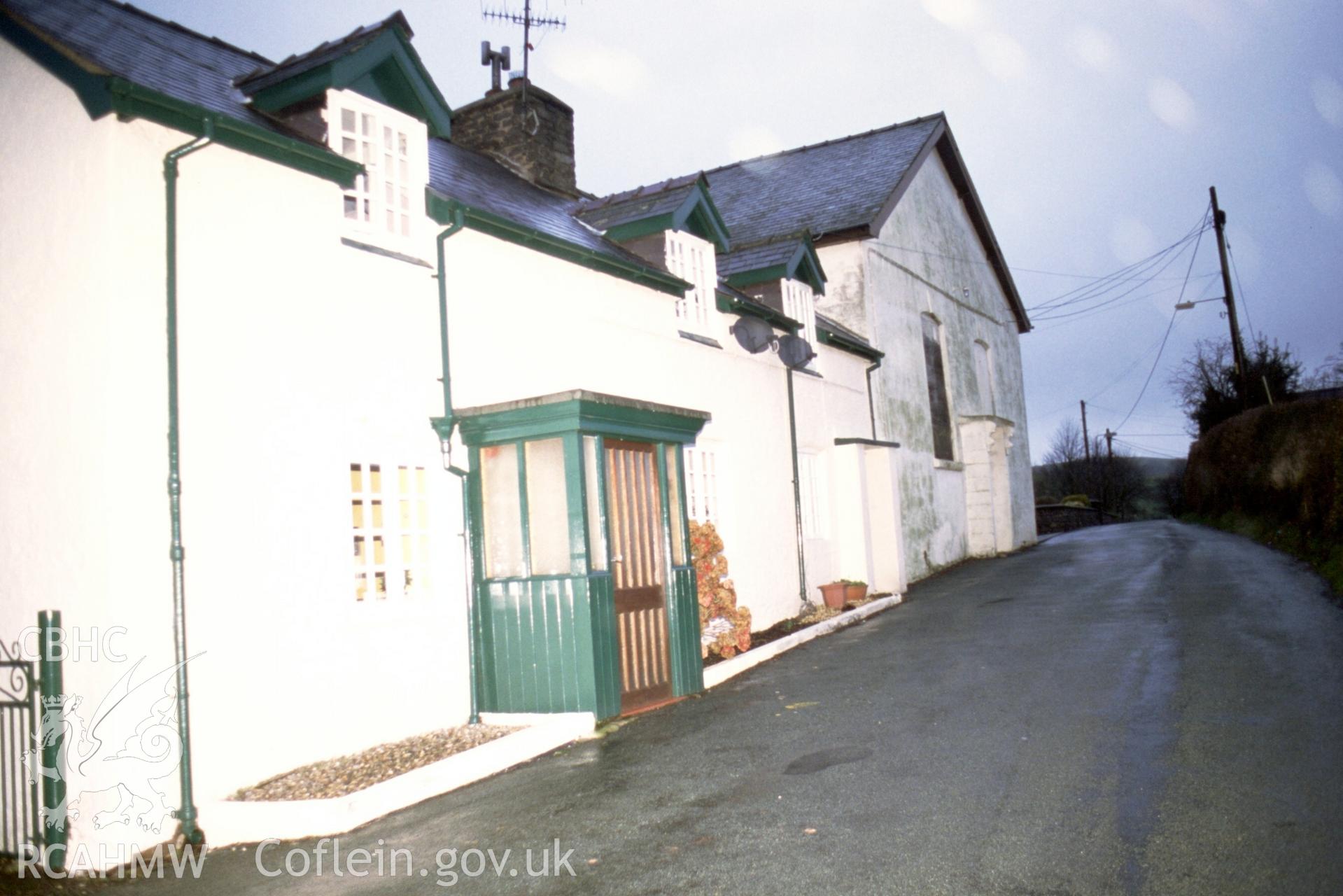 Exterior. front gable and adjoining house