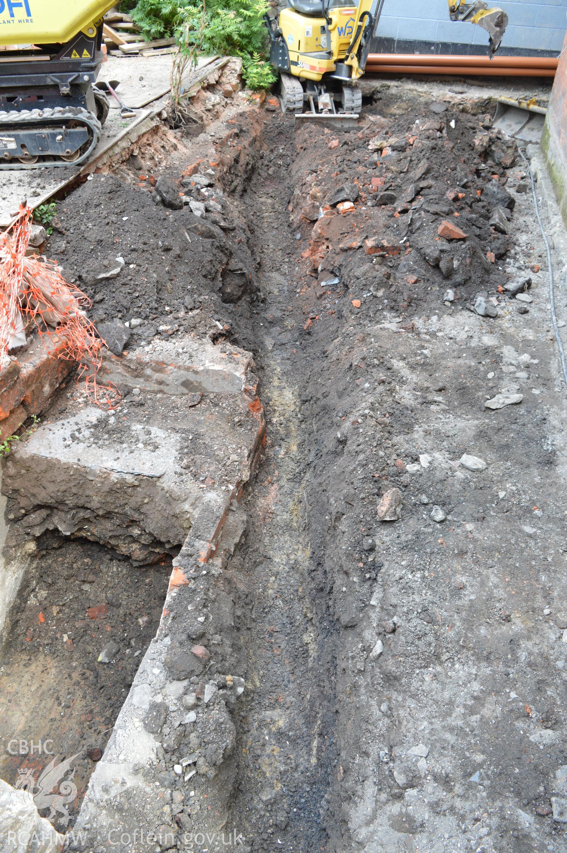 Digital colour photograph showing view from the north west showing drainage trench. Photographed as part of CPAT Project 2351: 2 Severn Street, Welshpool, Powys - Archaeological Watching Brief, 2019. Report no. 1663.
