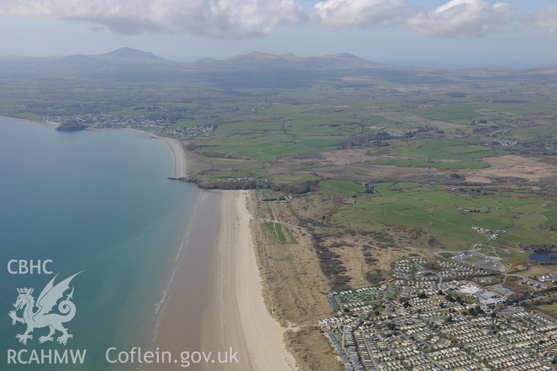 Morfa Bychan, Porthmadog, and the Black Rock sands anti-invasion defences. Oblique aerial photograph taken during the Royal Commission?s programme of archaeological aerial reconnaissance by Toby Driver on 1st May 2013.